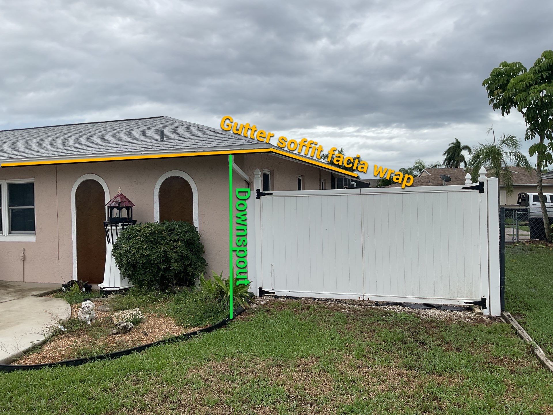 White Seamless Gutters and Splash Guards in Fort Myers FL by Gutter Professor by Gutter Professors