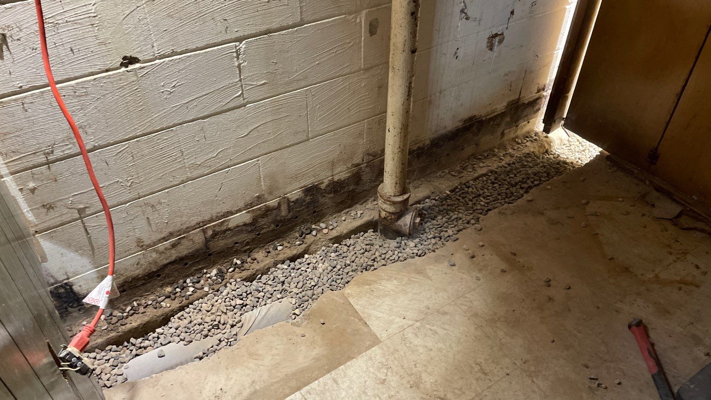 Interior Drain Tile Installation in Columbia Heights, MN by Waterproofing Northeast