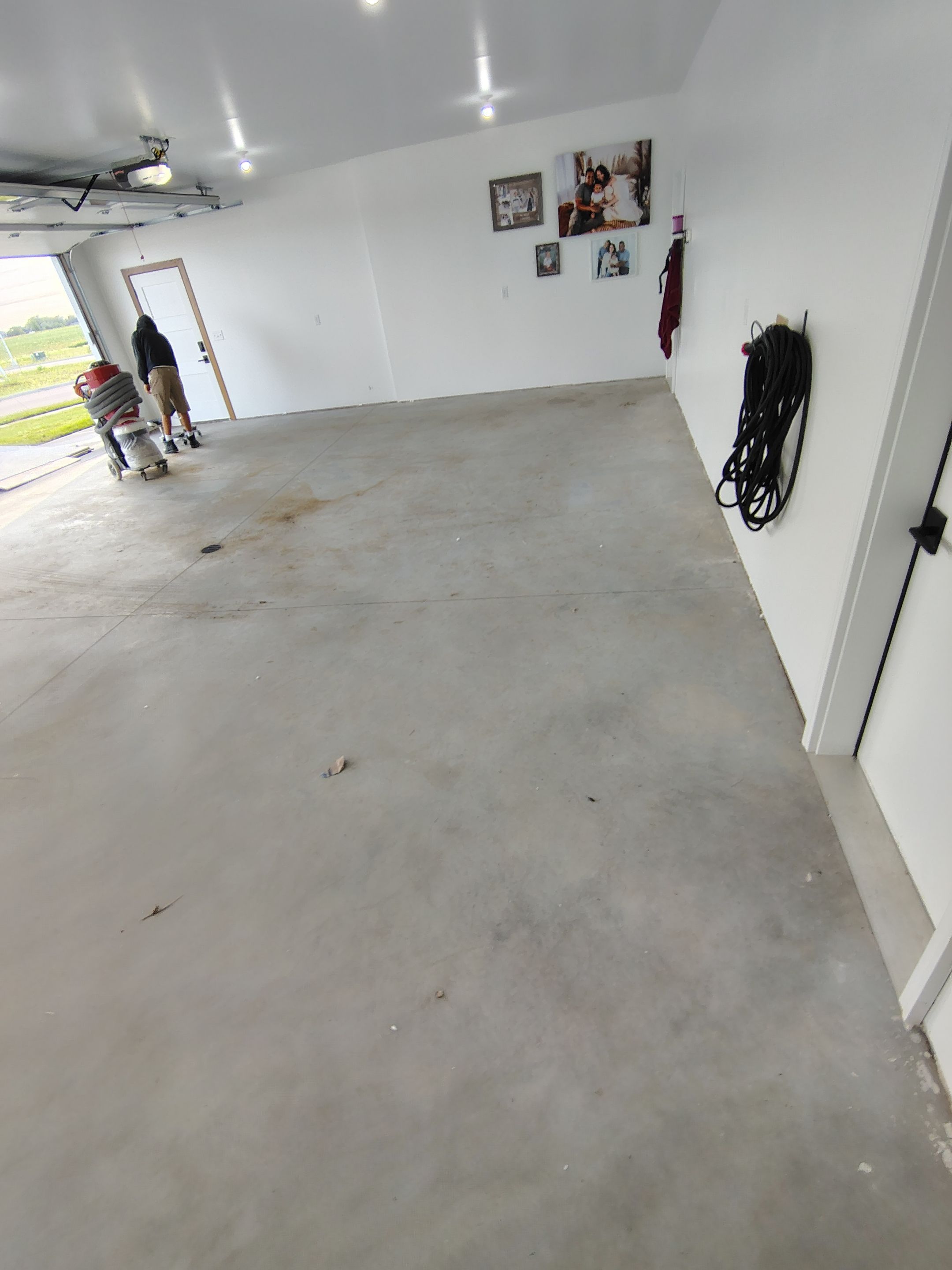 Gray and White Speckled Epoxy Garage Floor Coating in Tea by Select Painting, Coatings & Garage Cabinets