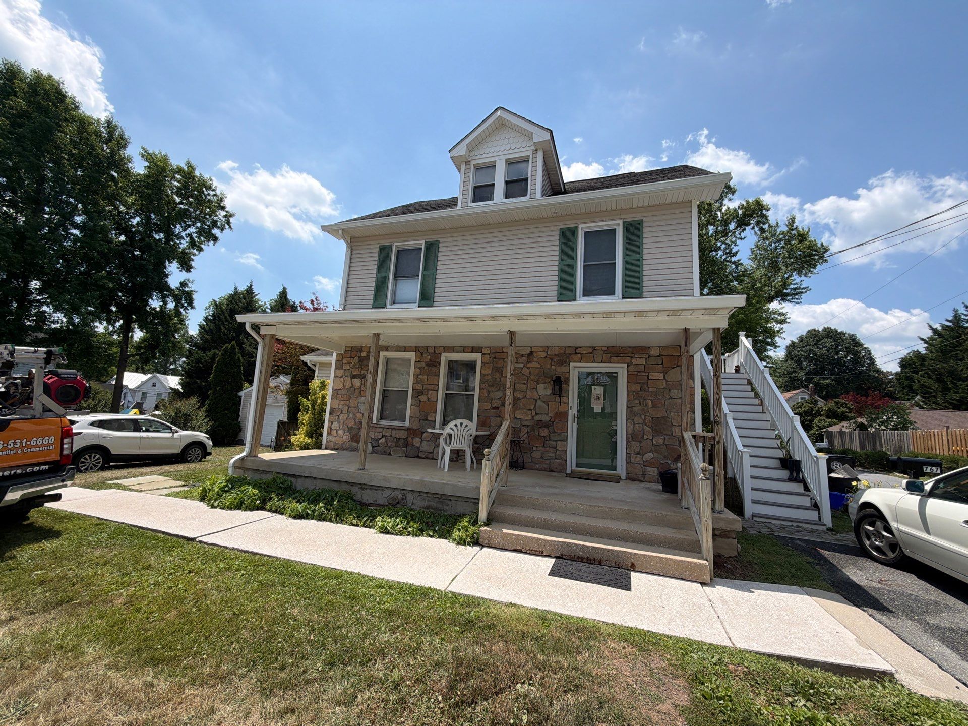 Whole-Property House Washing for Vinyl Siding and Stone Accents in Sykesville by Baltimore Pressure Washers Inc.