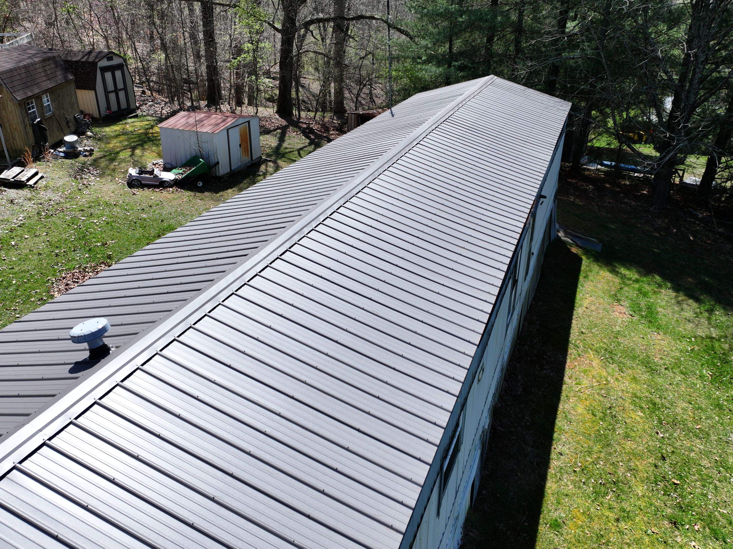 Textured Charcoal Gray using 29 Gauge AG Panel by Omnia Roofing