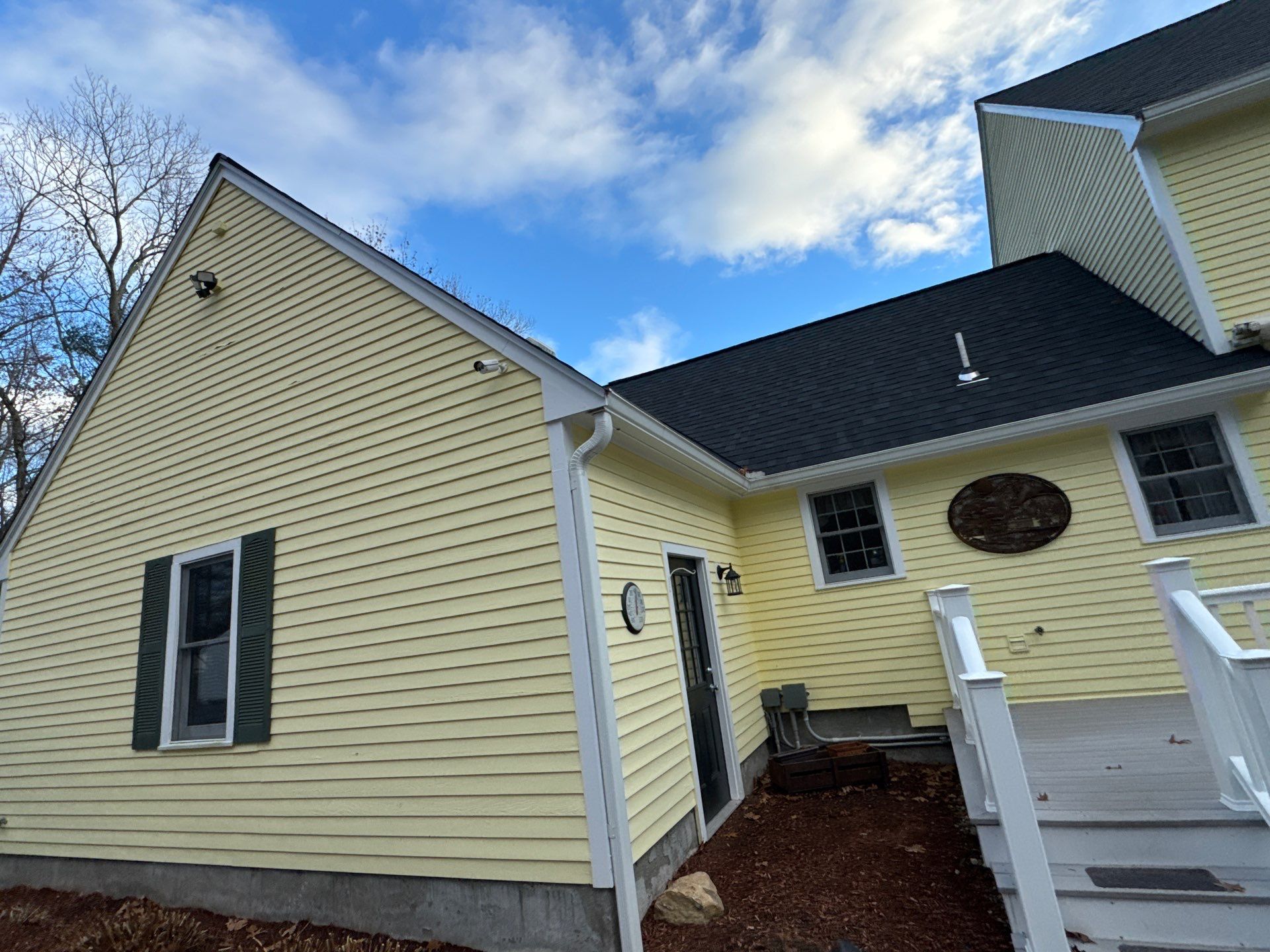 Chelmsford Premium Roof: Onyx Black Shingles with Standing Seam Metal Porch by Mighty Dog Roofing of Greater Middlesex County