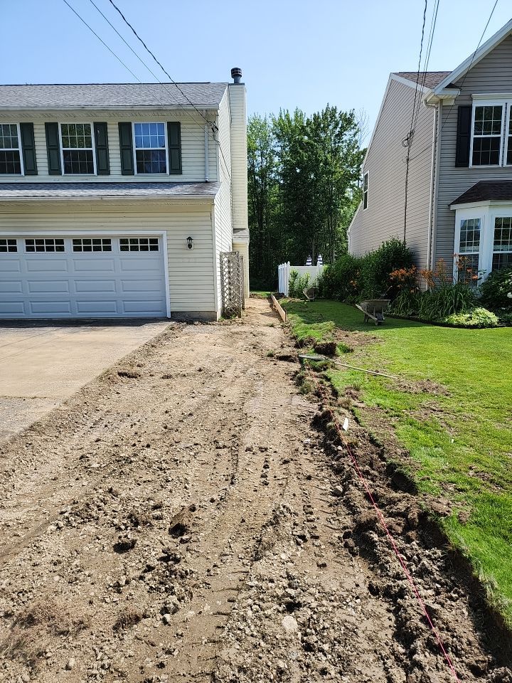 Stamped Concrete, Entry Door, and Concrete  by Ivy Lea Construction
