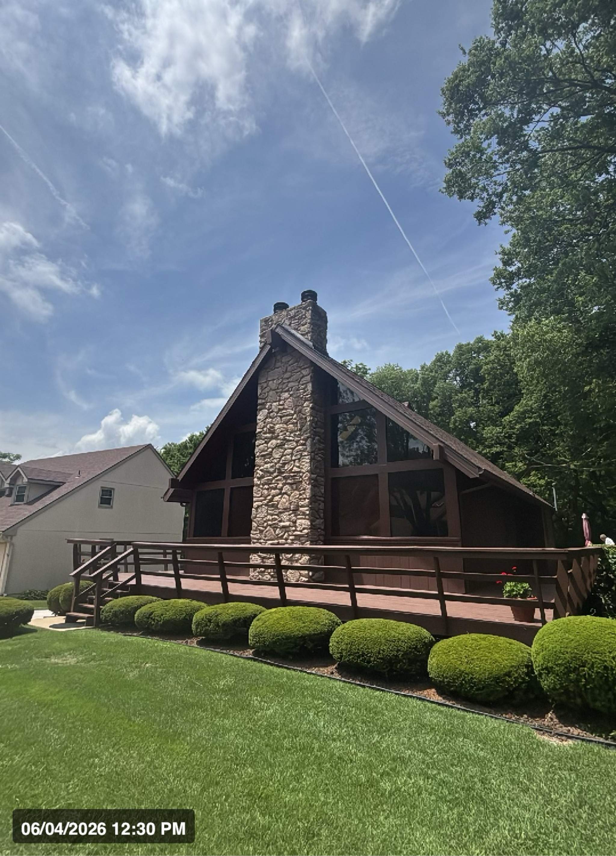 Structural Stone Chimney Restoration and Roof Repair in Leavenworth by Summit Roofing
