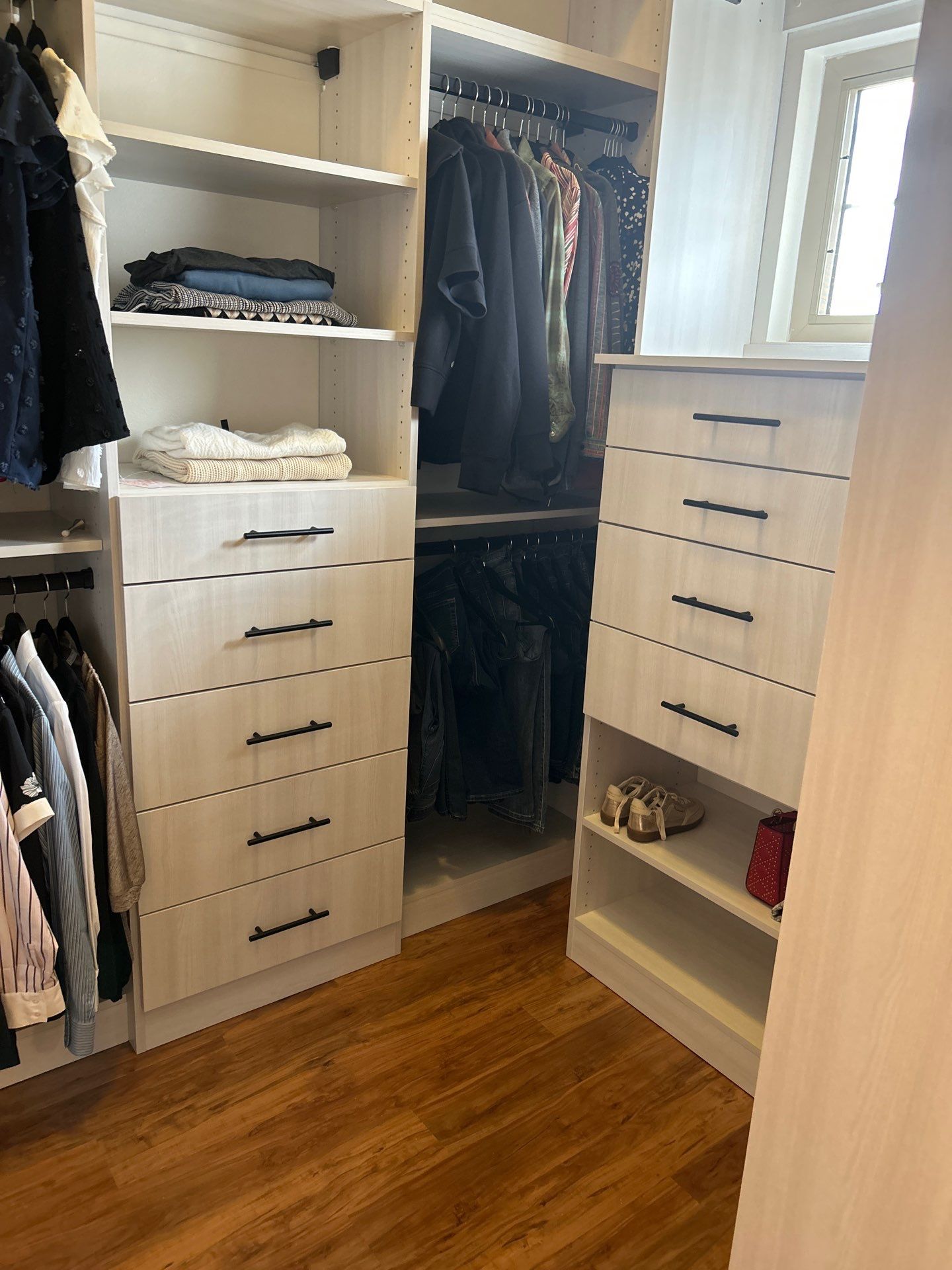 Walk-in Closet in a Small Space by Concept 32, Inc.