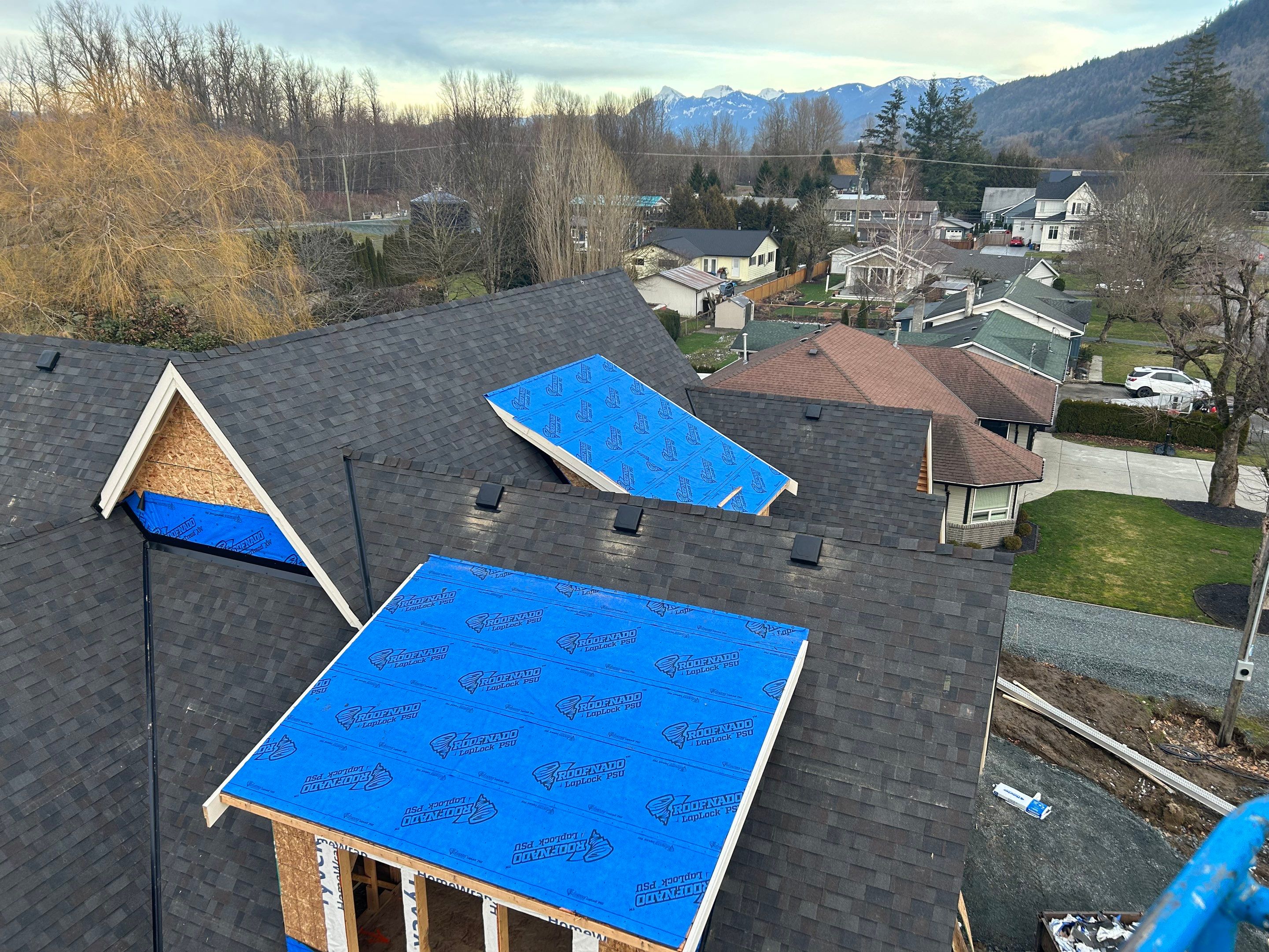 Residential Roofing Installation using Malarky Vista Shingles and Prolok Metal  by Top Notch Roofing Inc