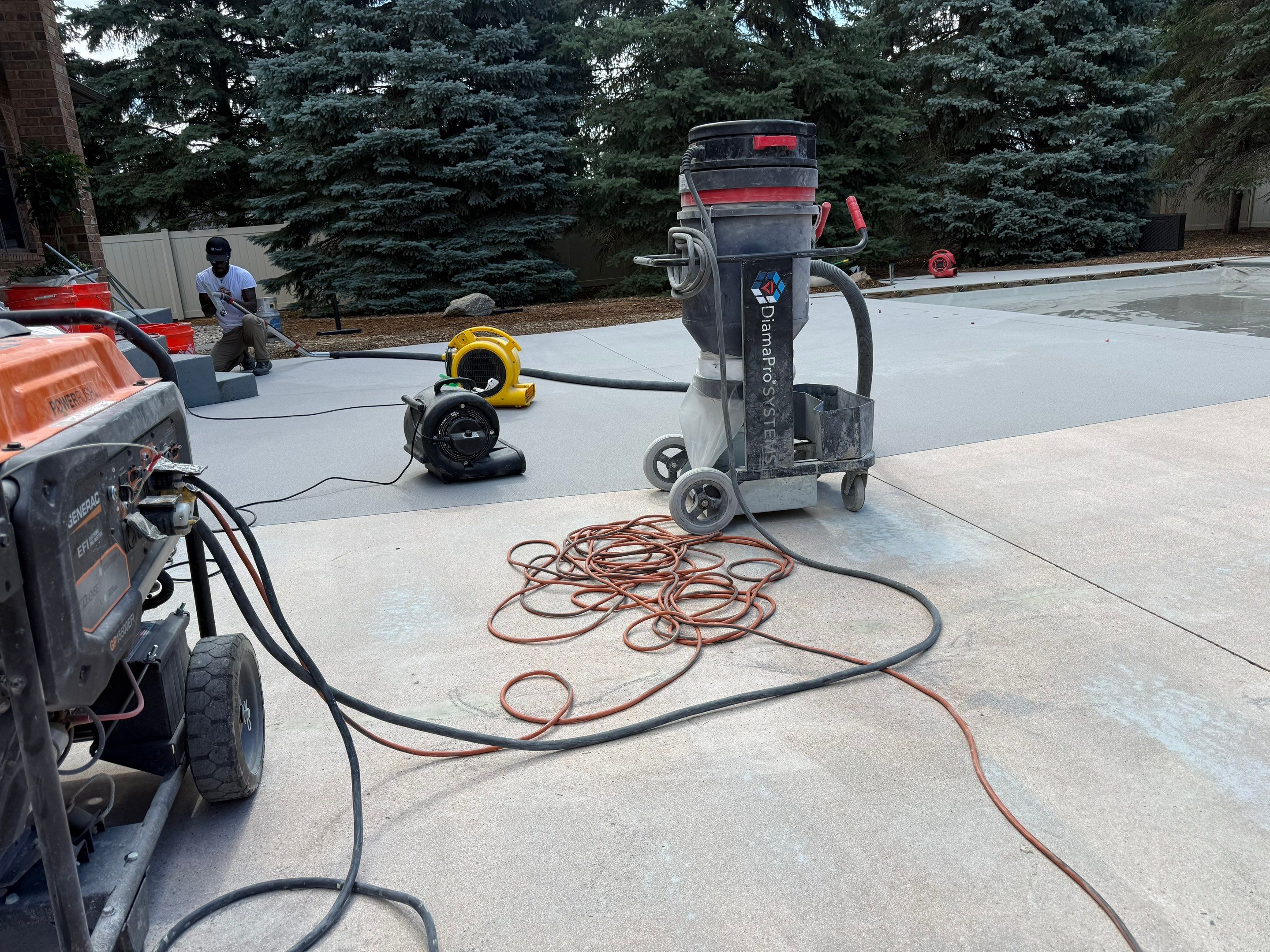 Decorative Concrete Pool Deck and Patio Resurfacing in Sioux Falls by Select Painting, Coatings & Garage Cabinets