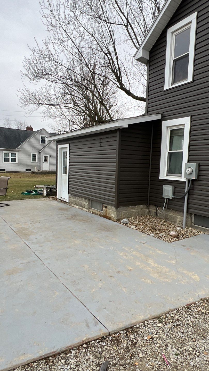 Residential fascia replacement using Exterior Portfolio 4.5 DL - Peppercorn by Nitro Roofing and Construction