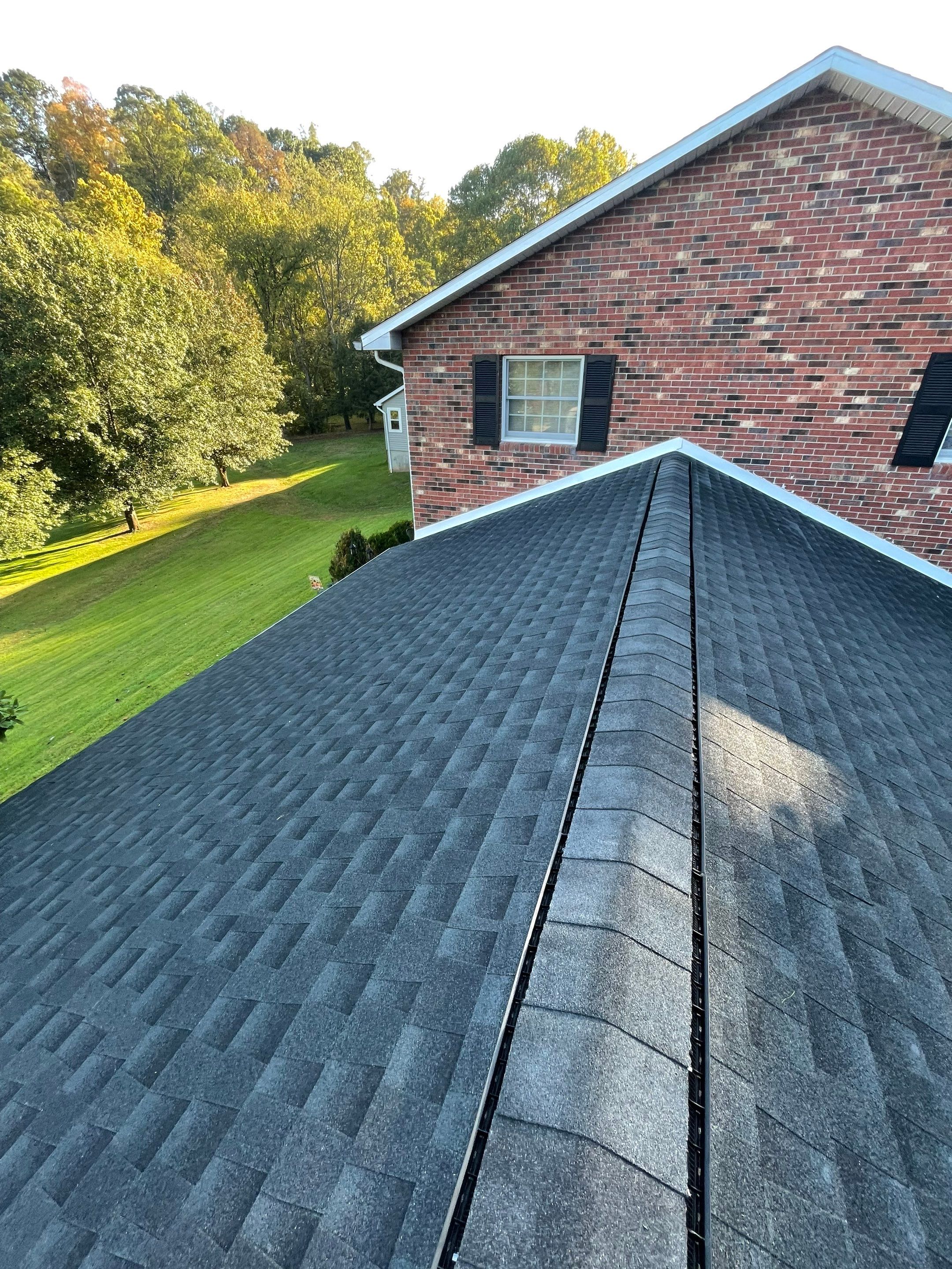 Residential Roofing Installation using GAF Timberline HDZ, Black by Rainstoppers Roofing