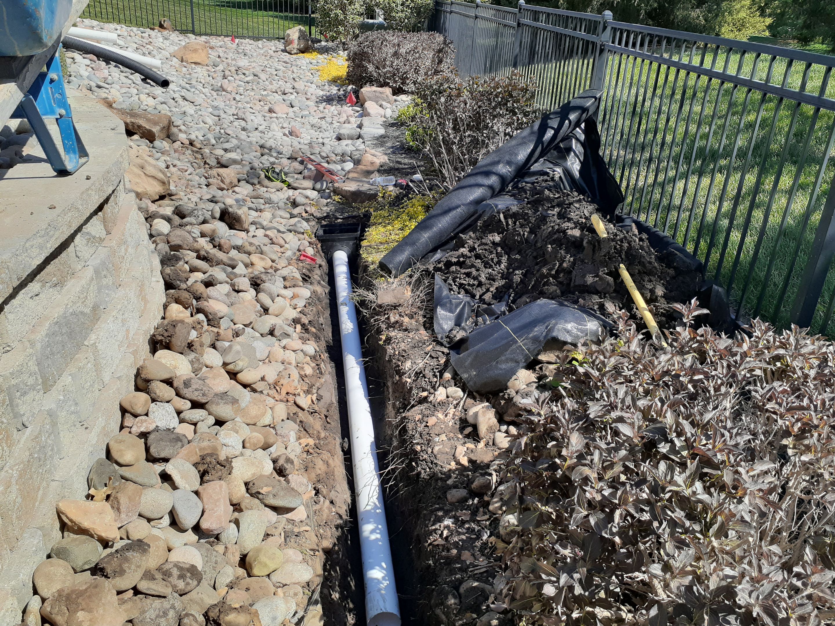 Pool Retaining Wall by LAND ESCAPES LLC