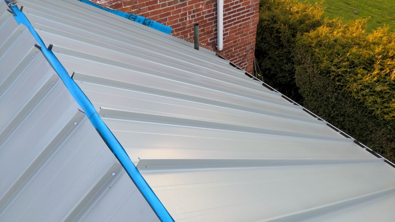 Standing Seam Metal Roofing using 16" Standing Seam Panels by Jay Carter Roofing & Sheet Metal