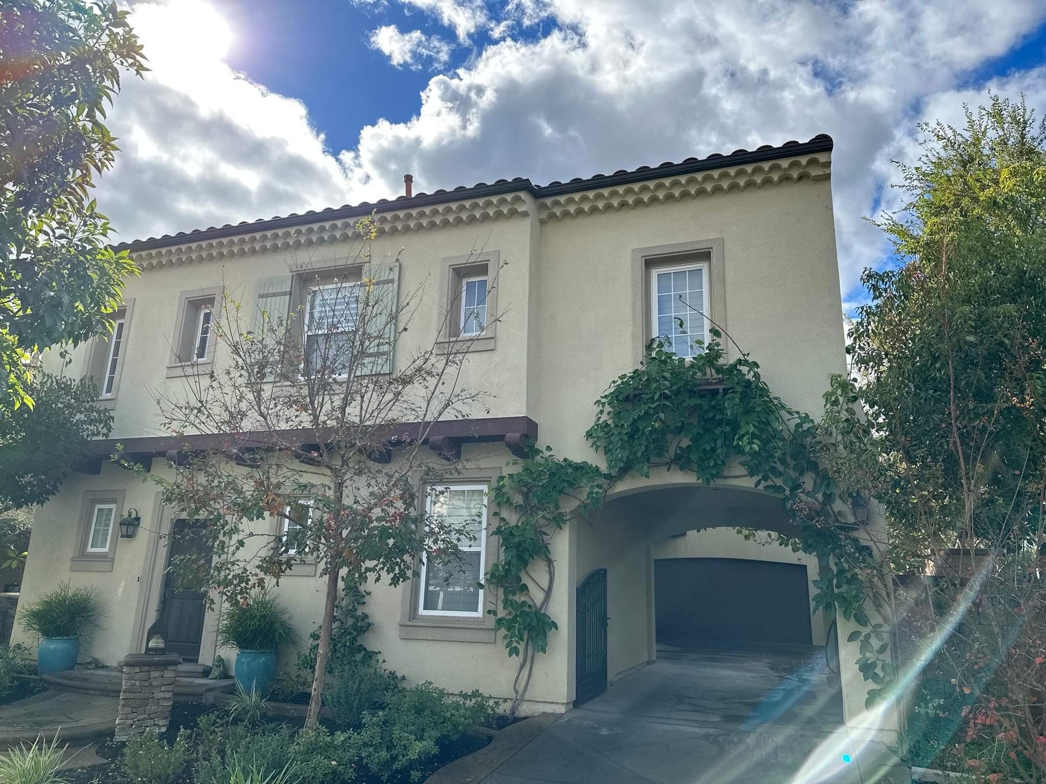 Clogged gutters at this Irvine home in Woodbury by Property Cleaning Experts, LLC
