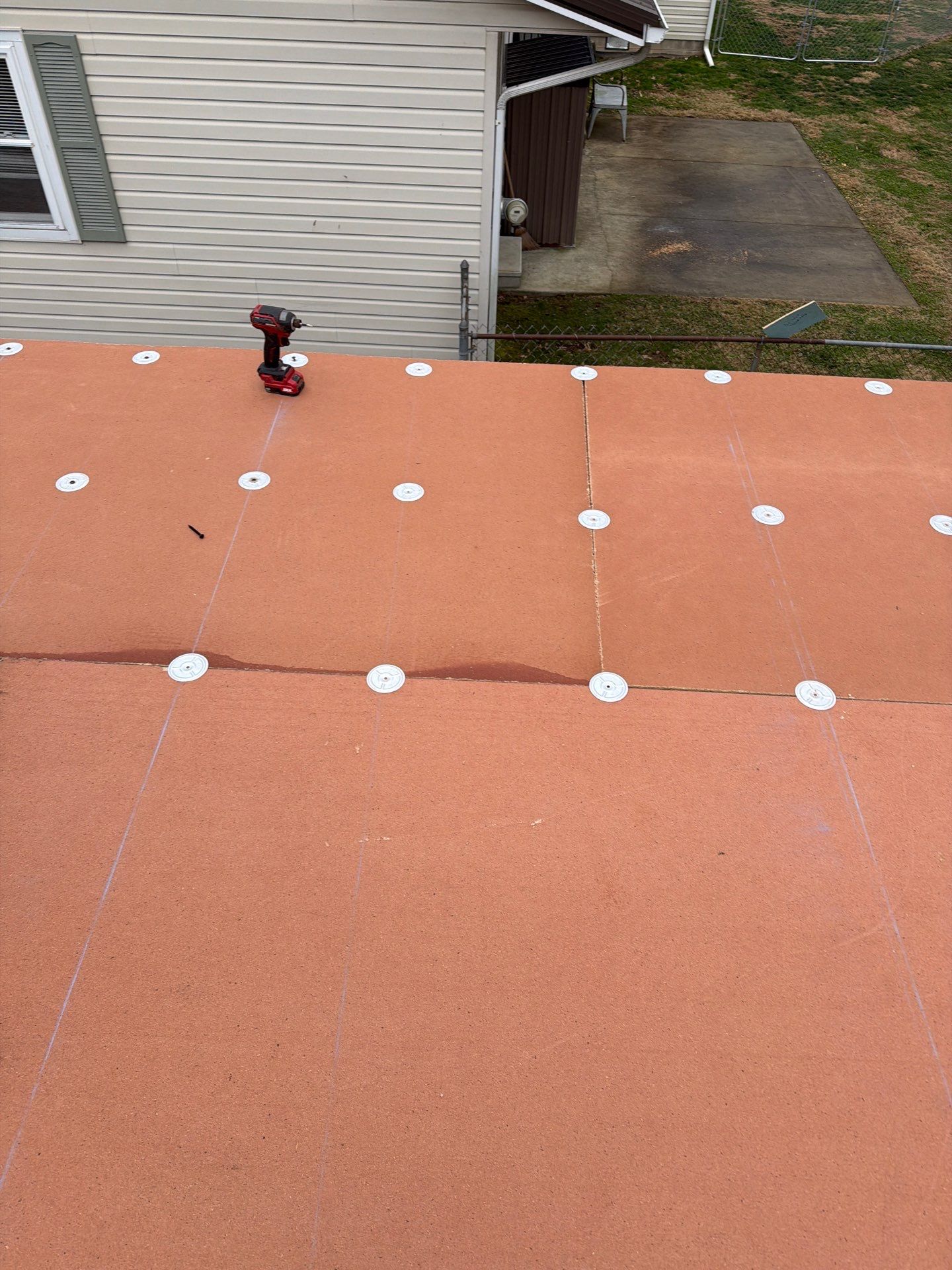 Residential Roofing Installation using EPDM and GAF Timberline HDZ Hickory by Rainstoppers Roofing