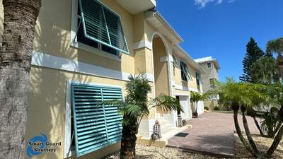 Impact Bahama Shutters in Pastel Turquoise