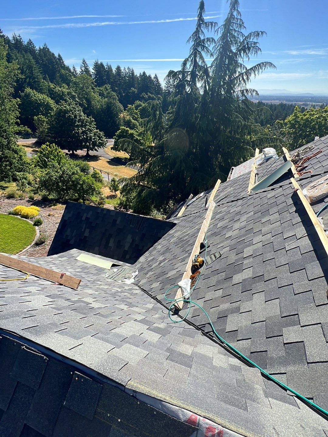 Residential Roofing Installation using Malarkey Windsor 50 Year Shingle (Color: Storm Grey) by Orezona Building & Roofing Company, Inc.