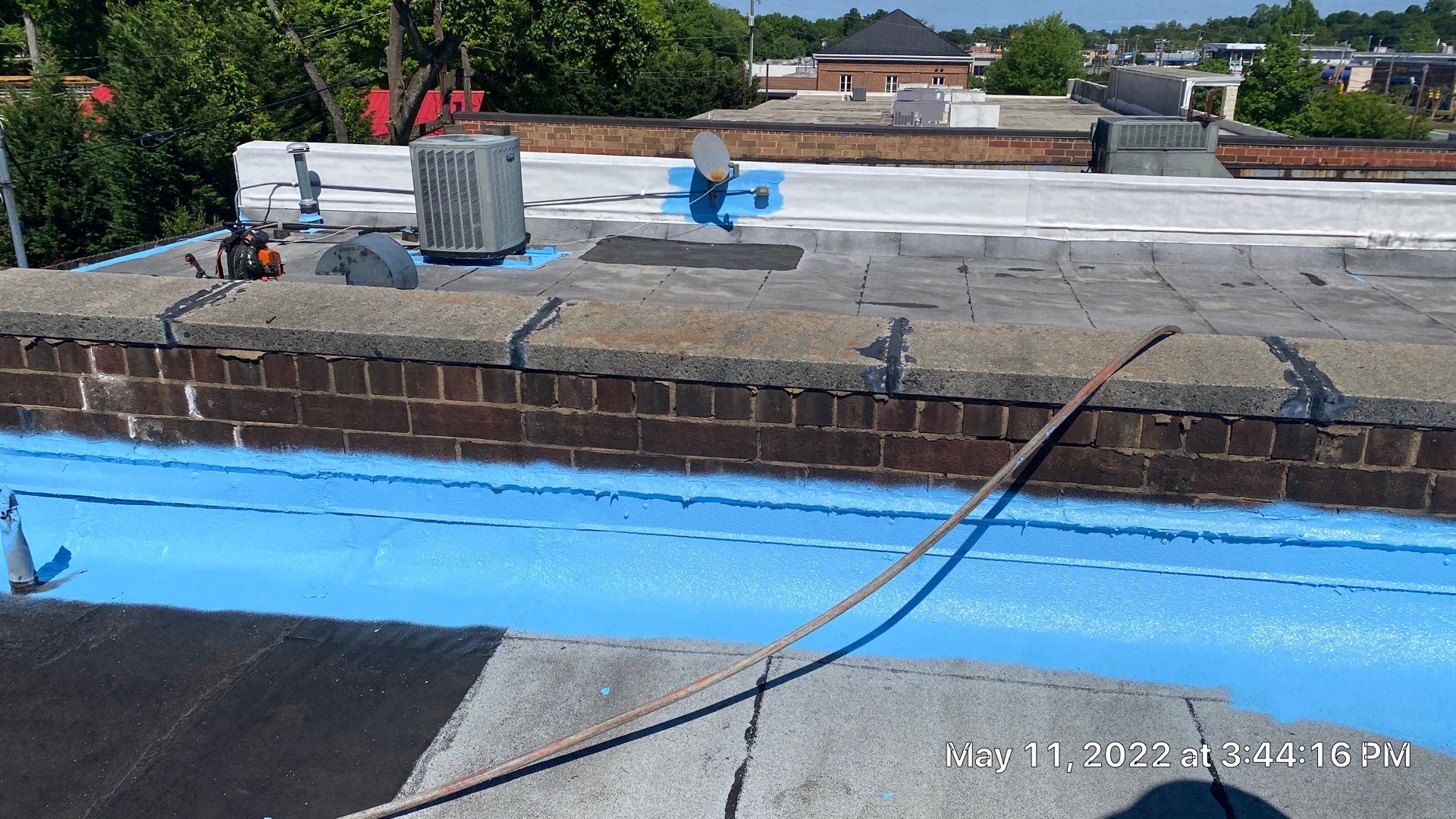 Commercial Roof Coating using Fiberseal basecoat and Silicon Topcoat by Just In Time Roofing and Restoration