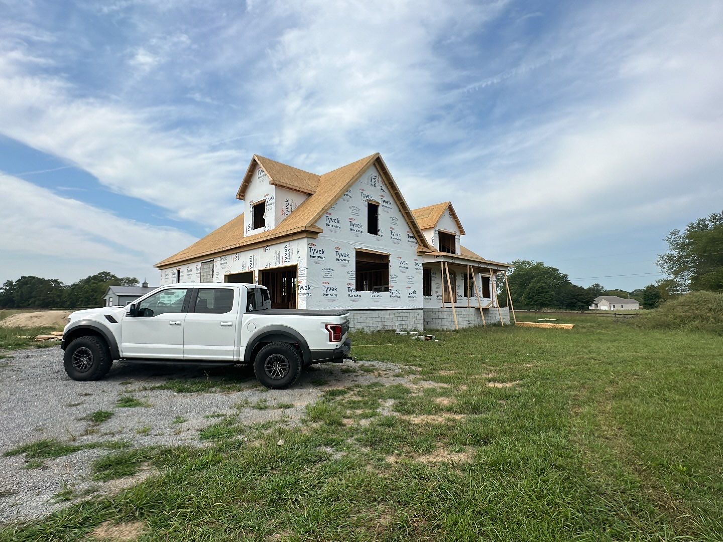 Residential Roofing Installation using Tamko Heritage AR with Standing Seam Metal Porch by Undersun Roofing 