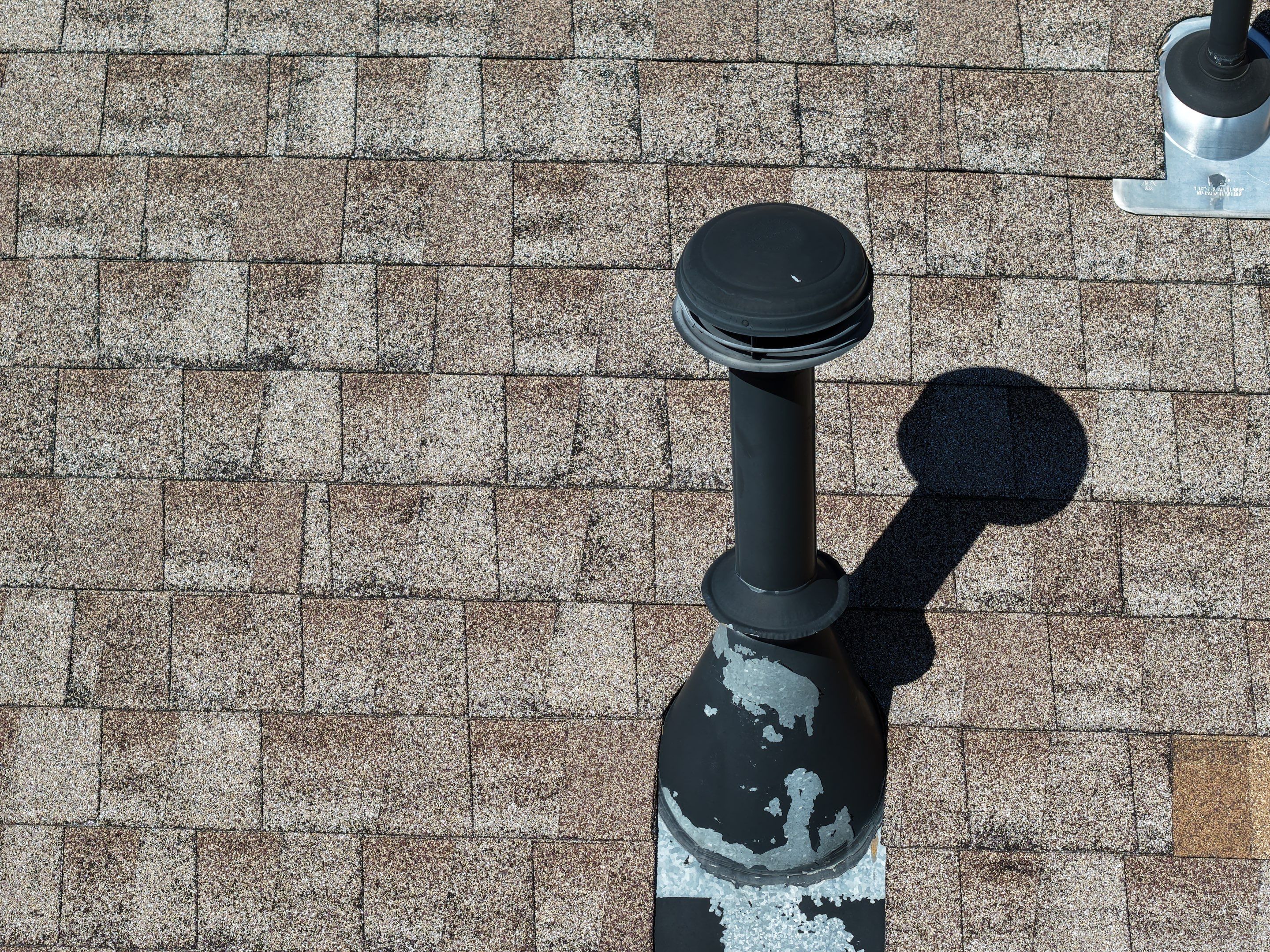 Residential Roofing Installation using TAMKO TITAN XT Rustic Black by RISE Roofing & Restoration, LLC