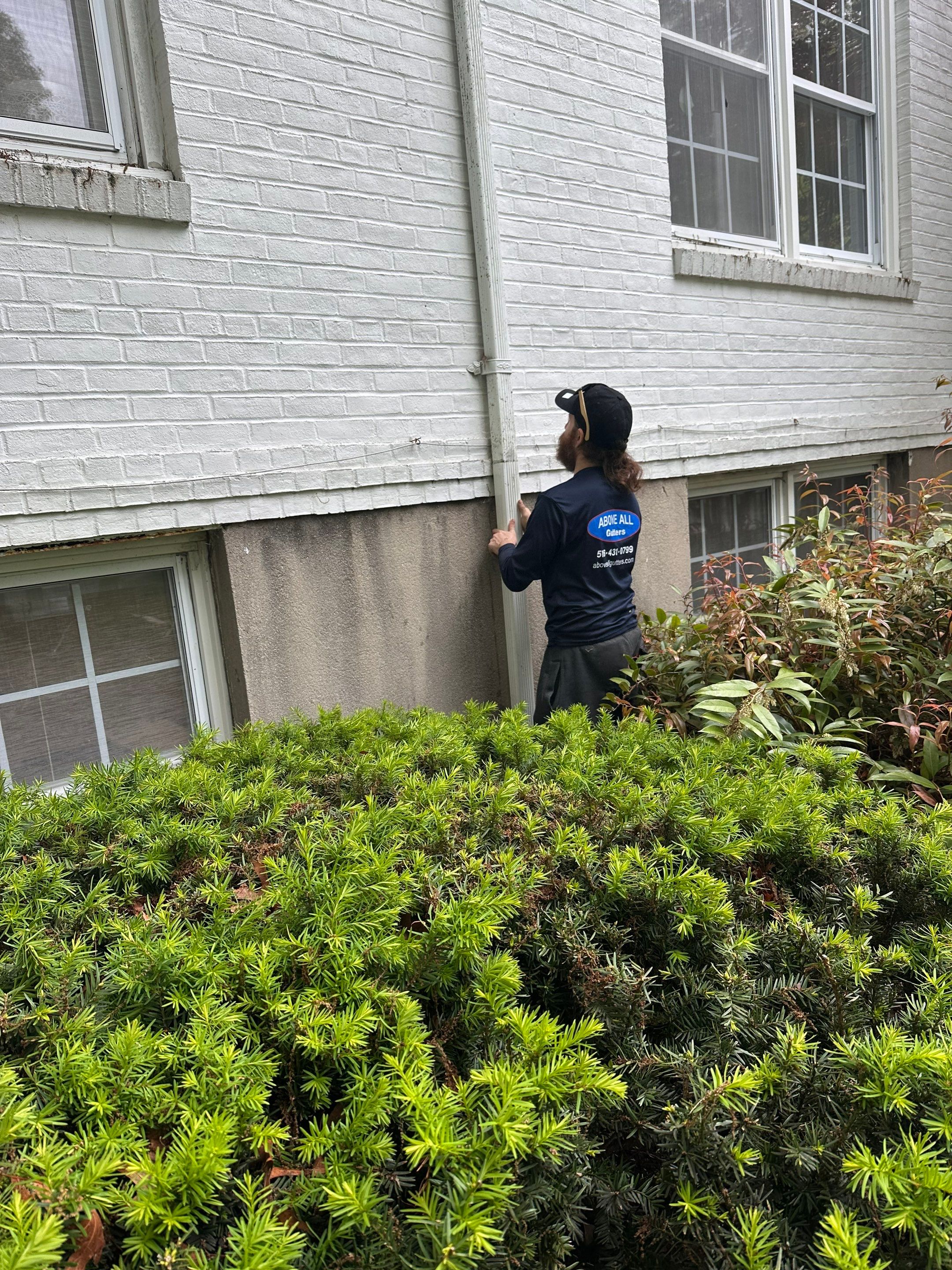 Preserving History: Gutter Cleaning at Mattituck Presbyterian Church by Above All Gutters 