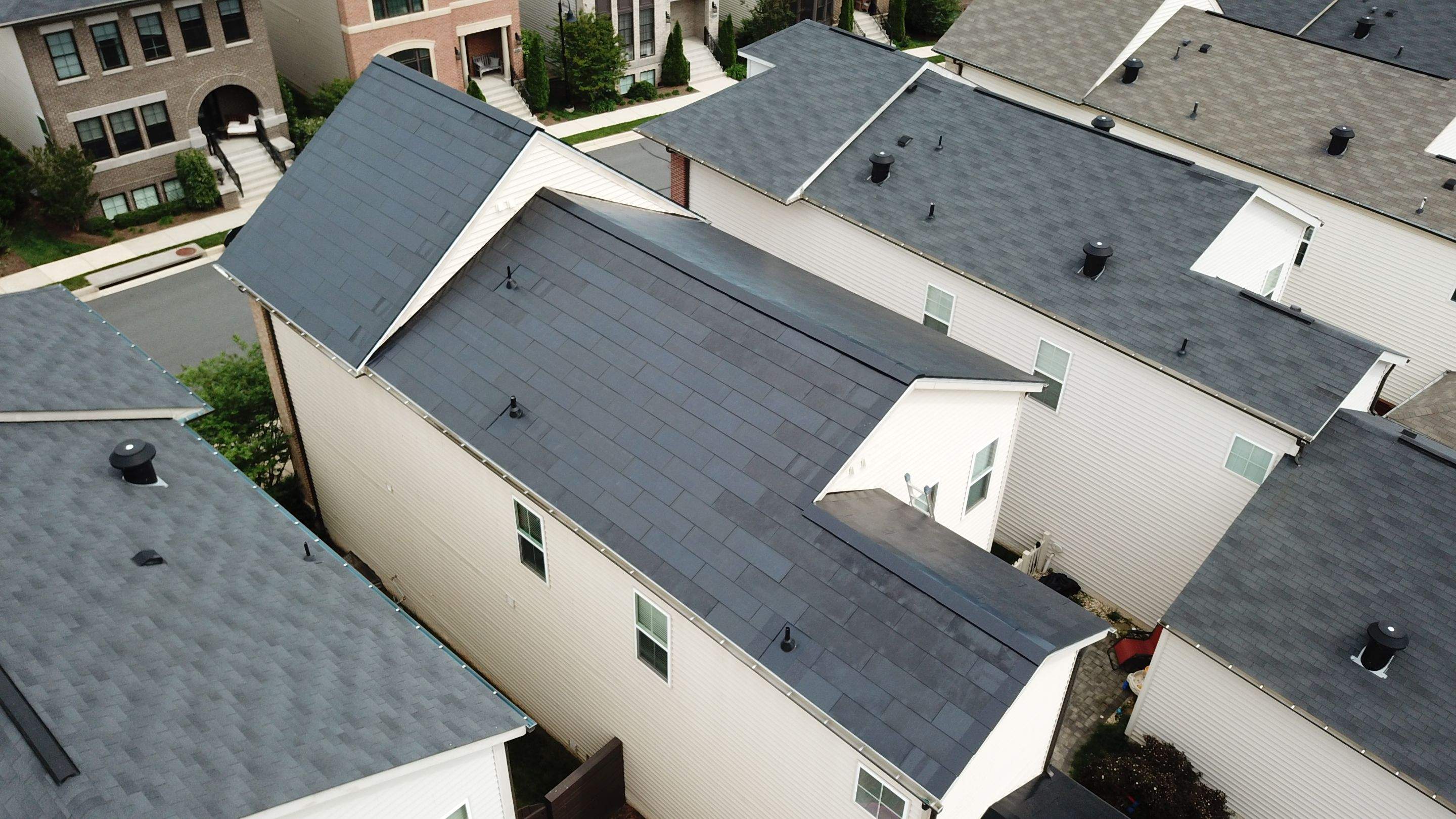 Tesla Solar Roof using Tesla Solar Roof V3 tiles by American Home Contractors