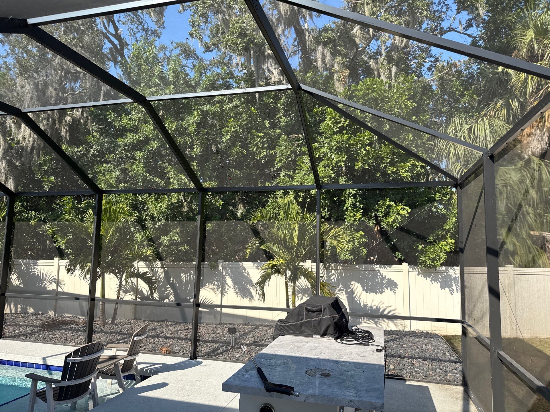 Painted Pool Deck & Screen Enclosure Cleaning | Heron Creek, Palmetto FL by Sunshine AquaWash