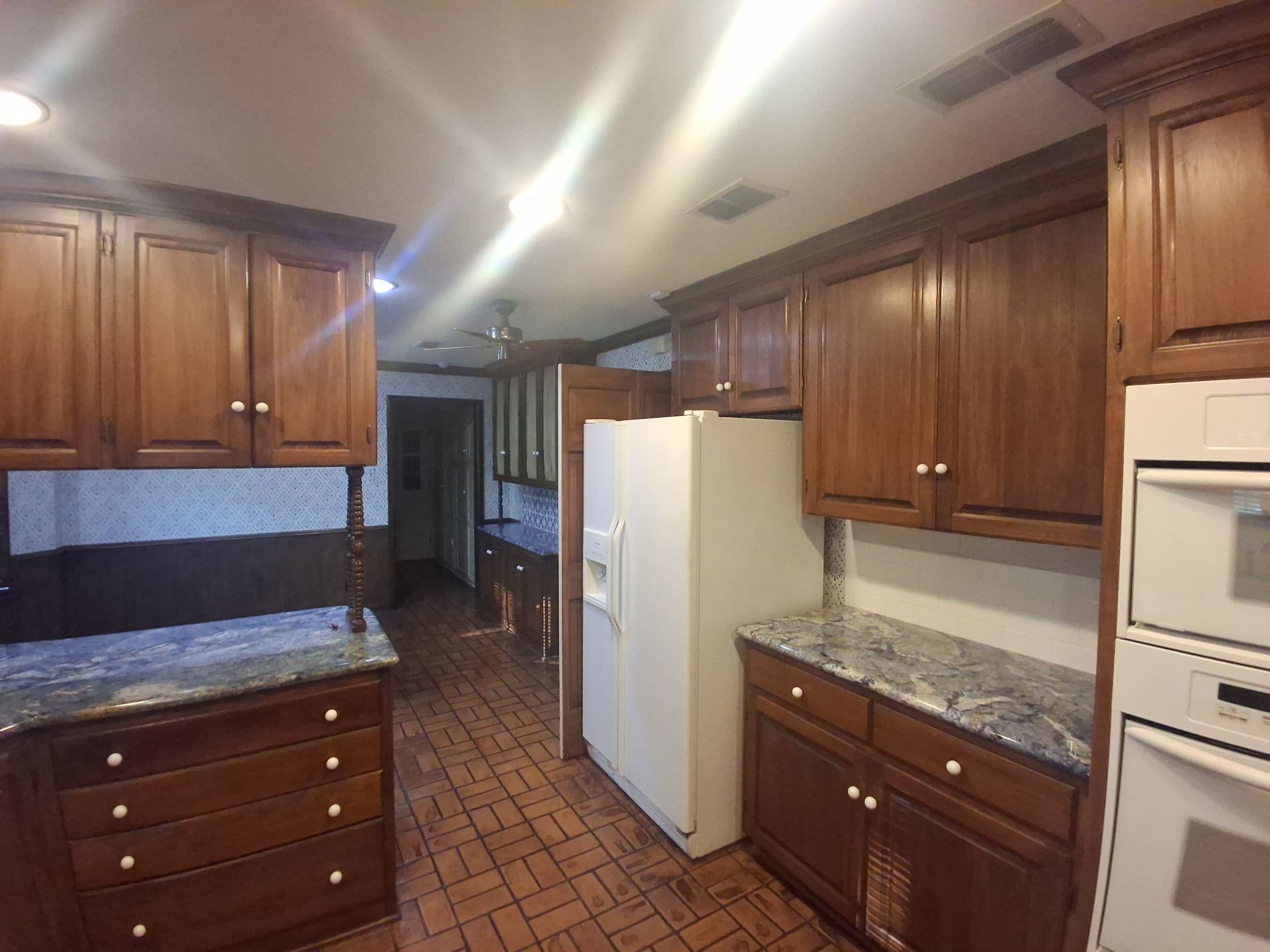 A Brilliant Cabinet Transformation | Tyler TX Quality Coats Painting by Quality Coats Painting