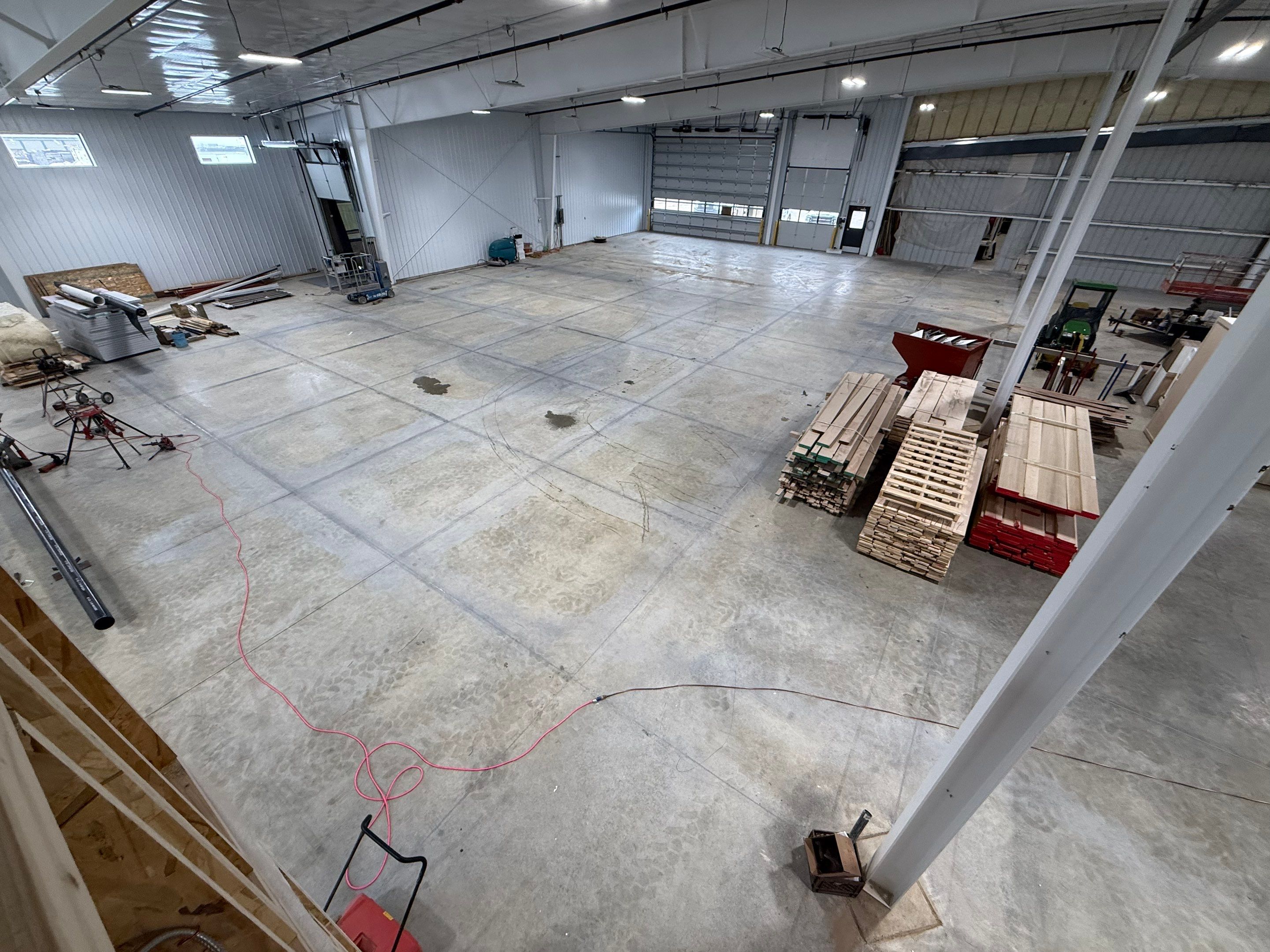 Industrial Concrete Polishing and Coating for Large Manufacturing Warehouse by Select Painting, Coatings & Garage Cabinets