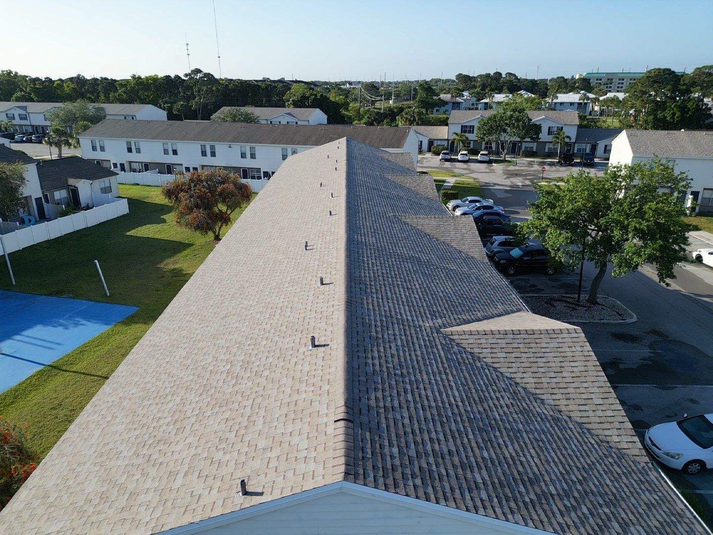 Apartment Complex Shingle Roof Replacement by Sailfish Roofing
