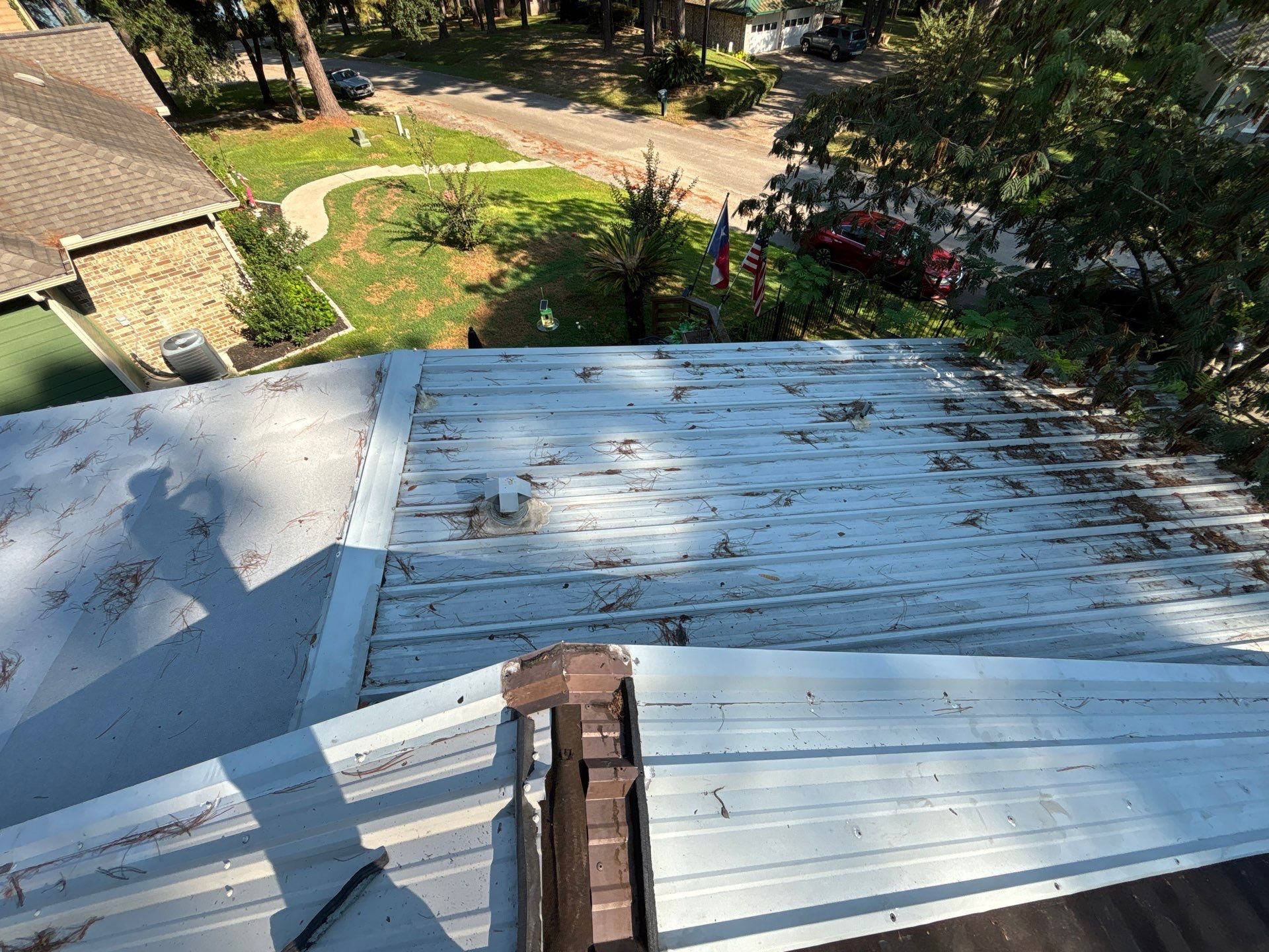 White Standing Seam Metal Roof Replacement in Willis, Texas by Abbott Roofing Company
