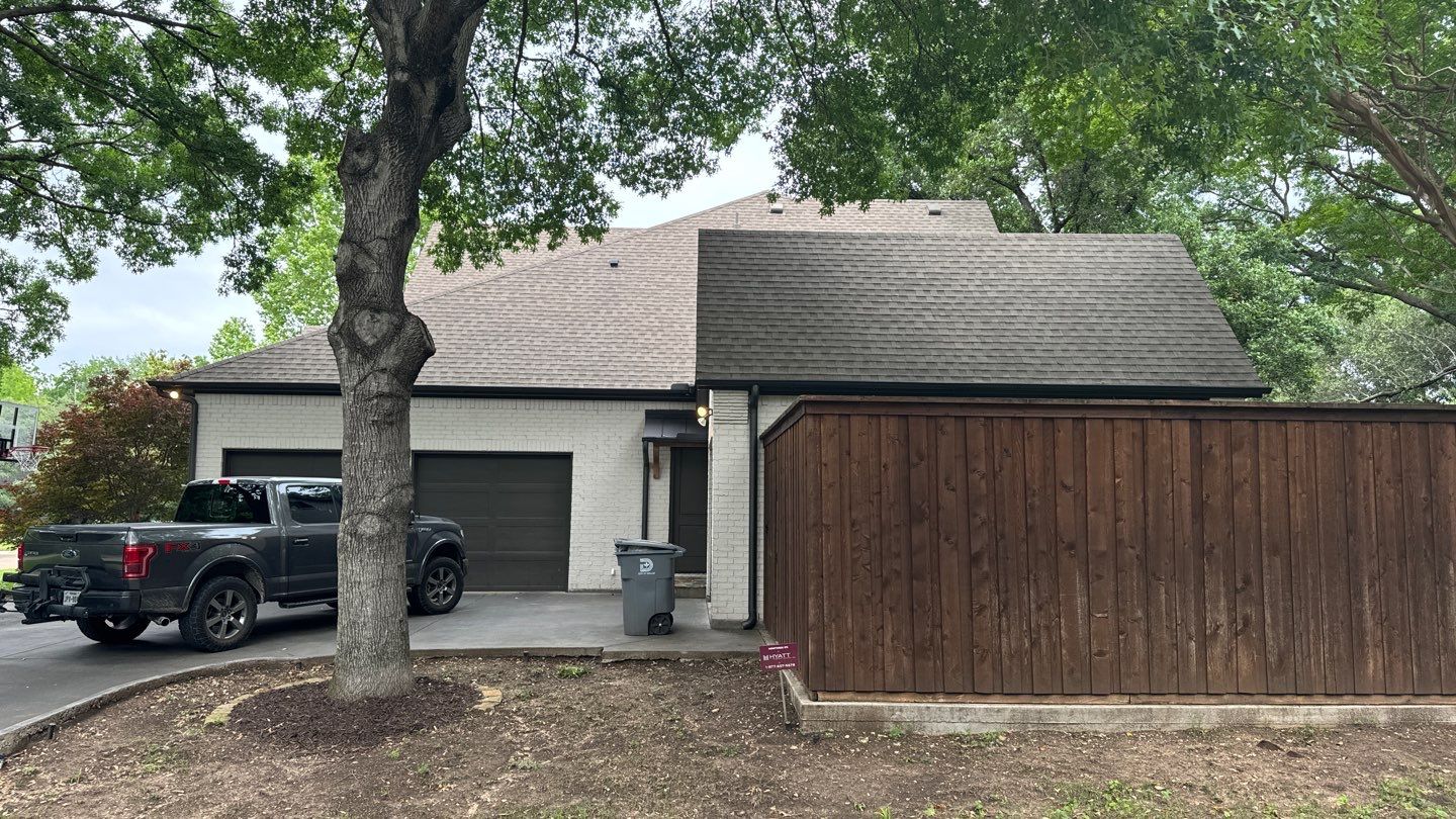 White brick with GAF Weathered Wood by Tejas Roofworks + Restoration