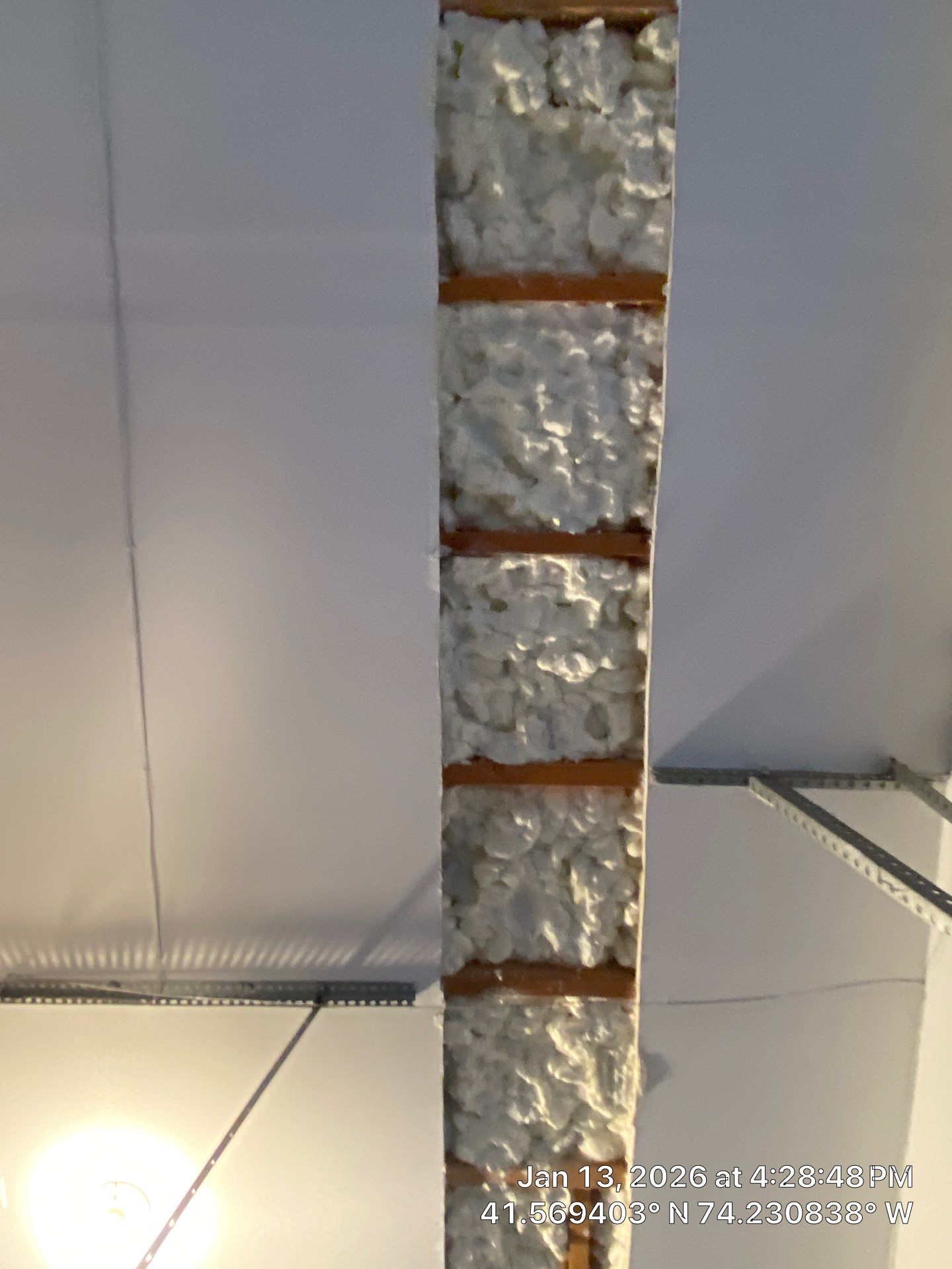 Garage ceiling using open cell spray foam by NYS Foam & Energy