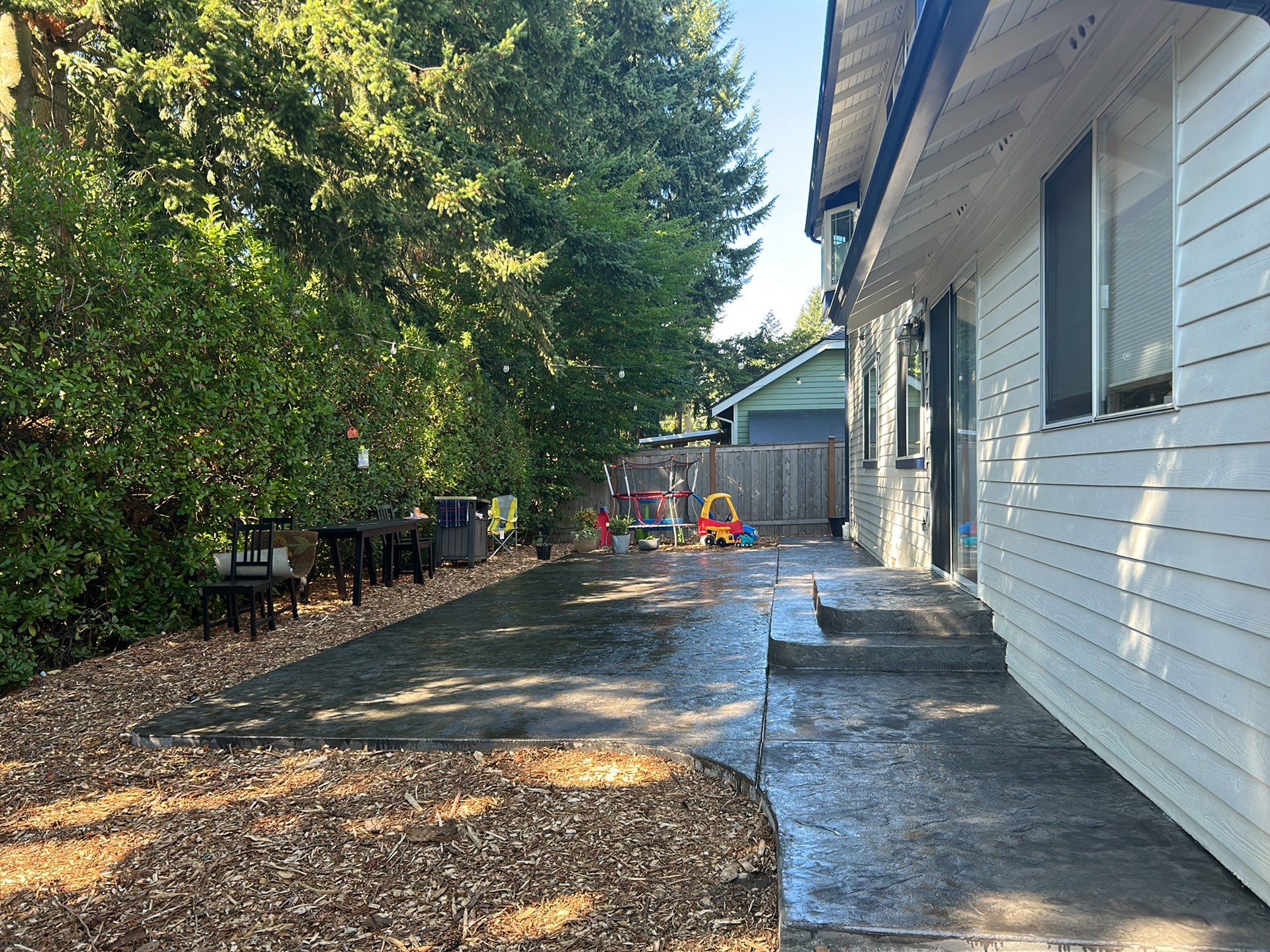 Luo | Colored Stamped Concrete Patio by Jireh Asphalt & Concrete Inc 