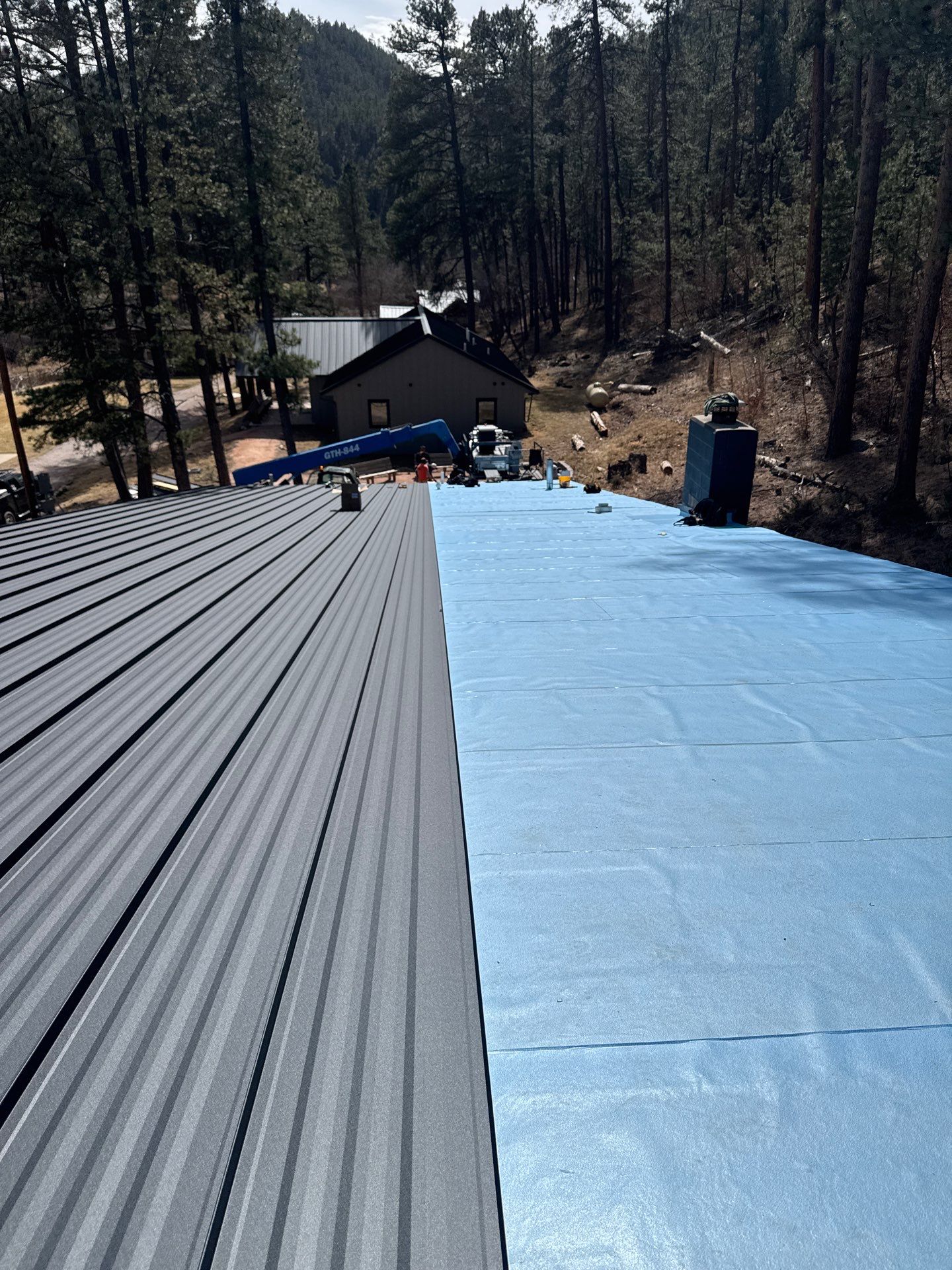 Residential Roofing Installation using Steel Roofing by Weather-Tite Exteriors LLC