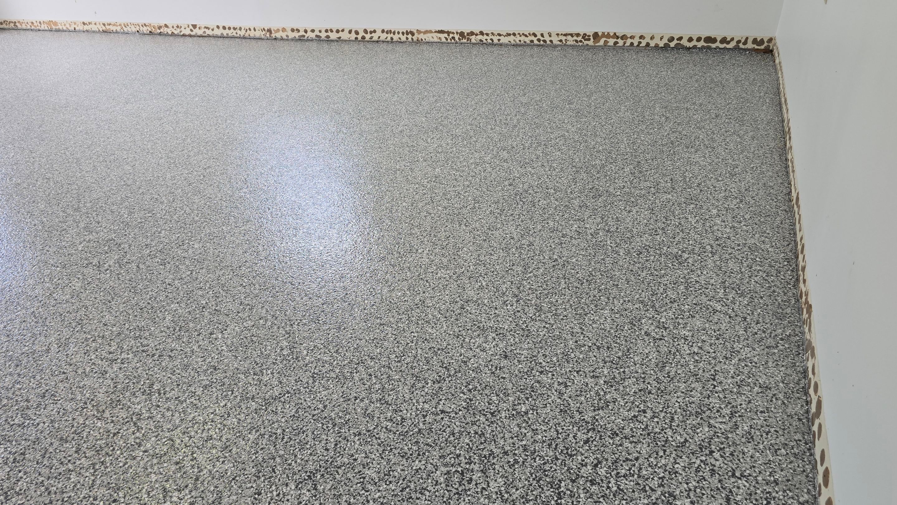 Garage using Gravel by Elite Floor Solutions
