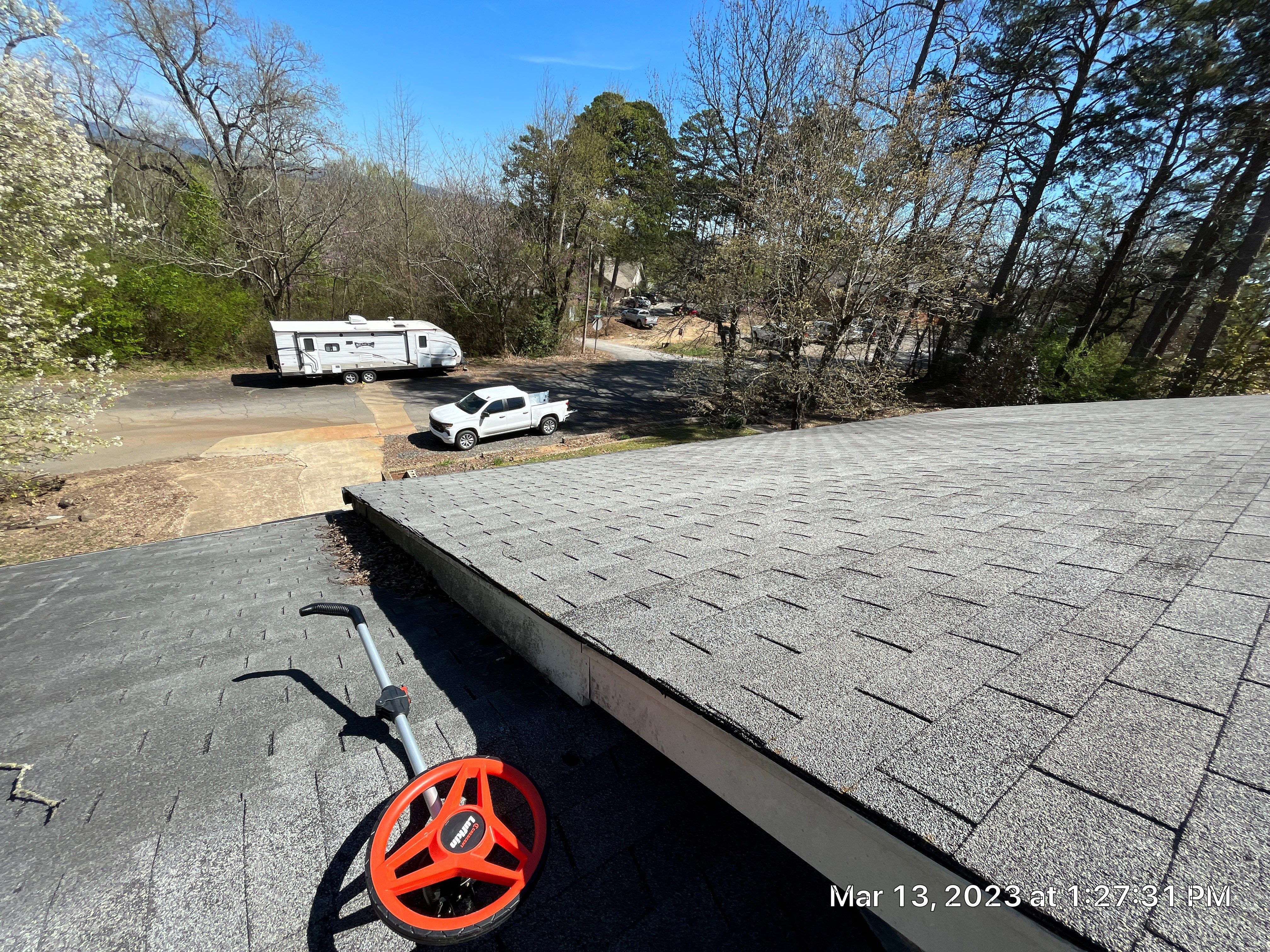 Residential Roofing Installation using 26 Gauge Colored Panels by Hostetler Roofing