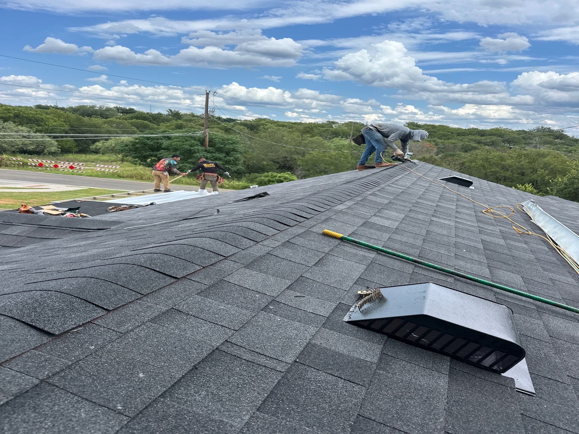 Residential Roofing Installation using Owens Corning Oakridge Onyx Black by DeZign Roofing & Exteriors