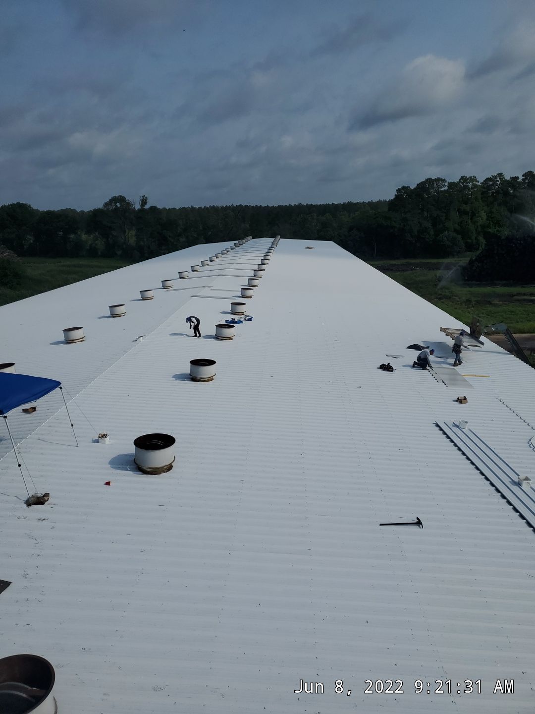 Commercial Roofing Installation using Aluminum Roofing panels by Hostetler Roofing