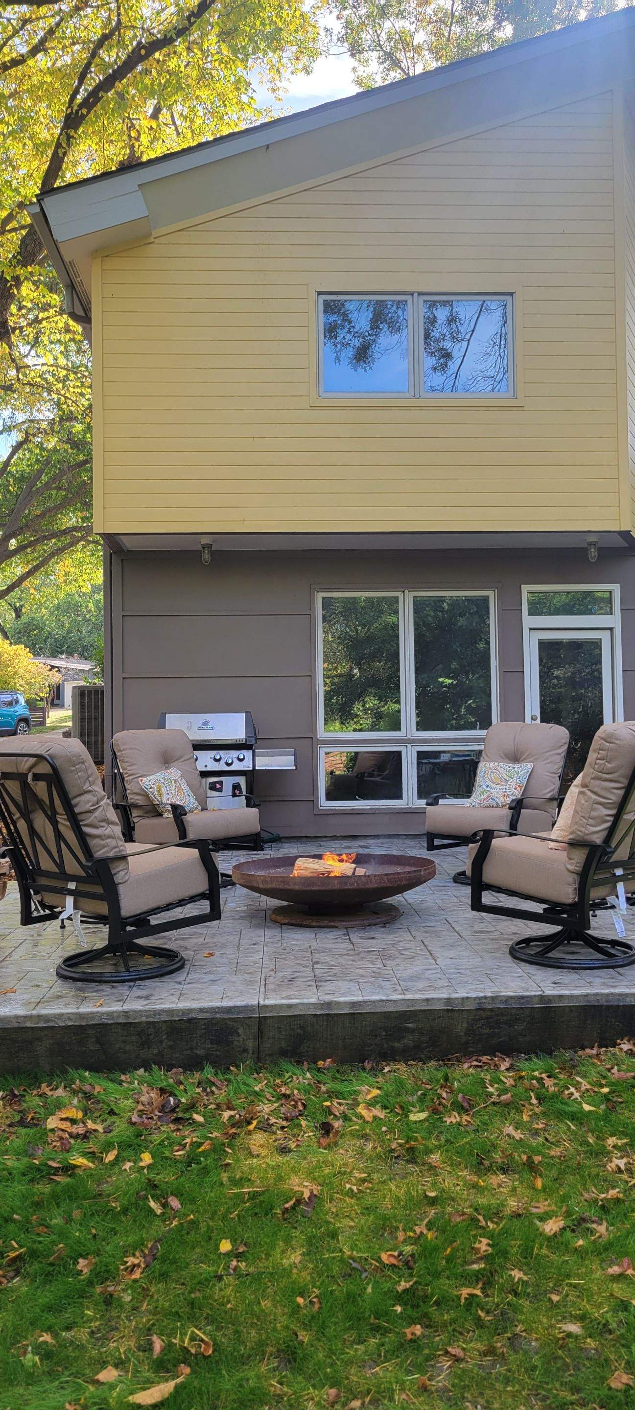 Back Yard Cantilivered Patio by LAND ESCAPES LLC