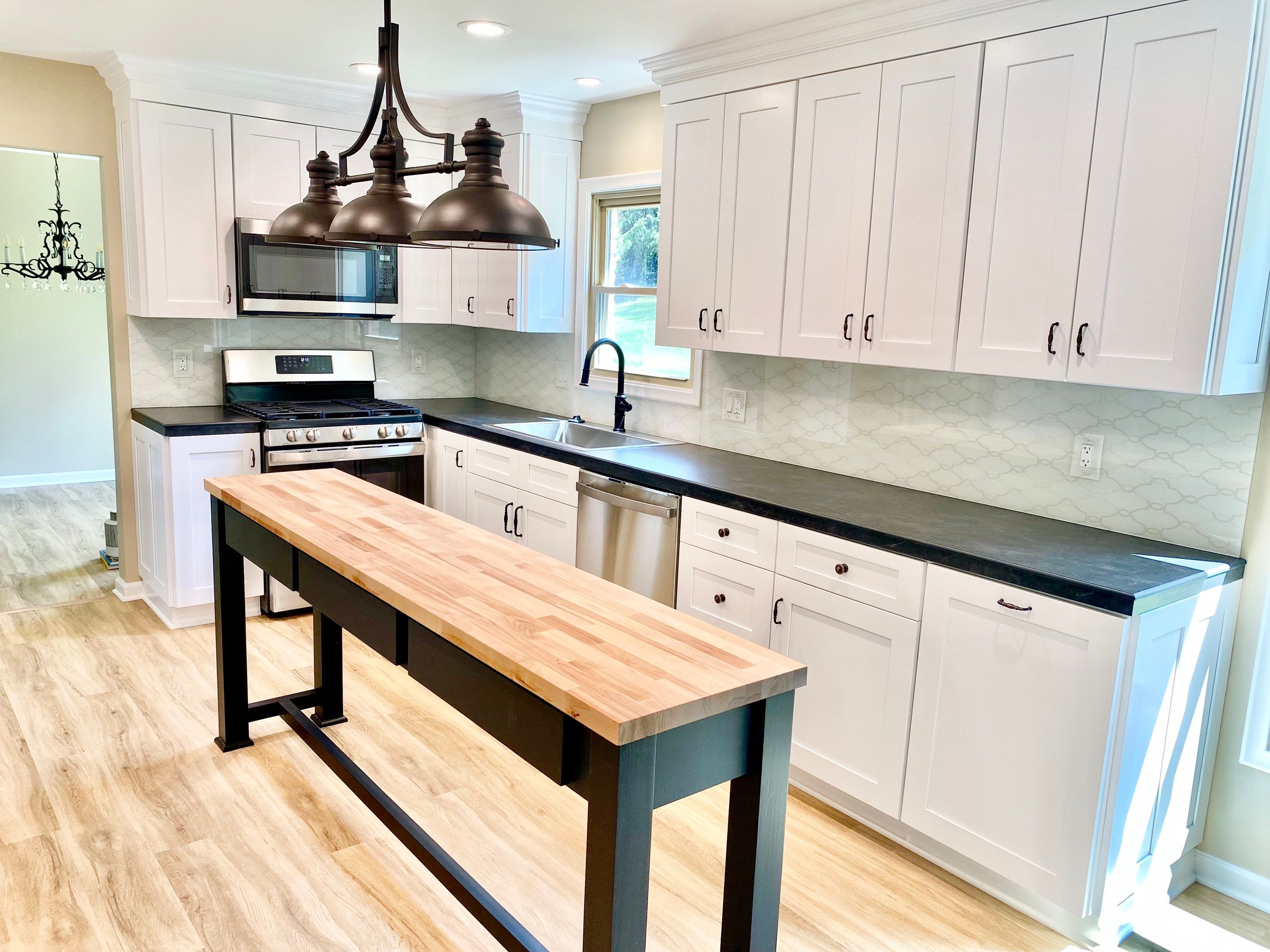 Kitchen Remodel using IMAGIO Arabesque Drops Solid Glass Backsplash by IMAGIO