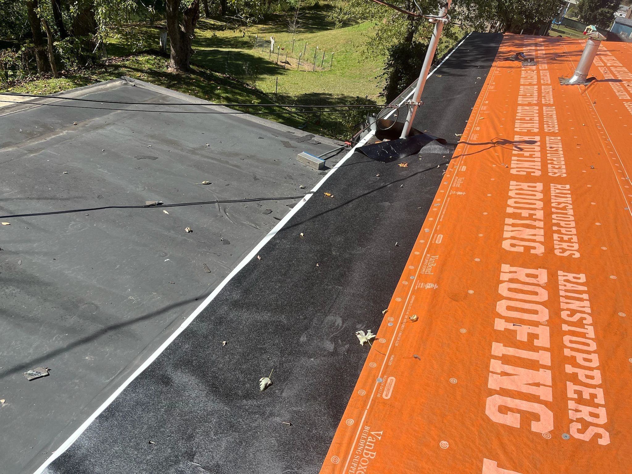 Residential Roofing Installation using GAF Timberline HDZ Shakewood by Rainstoppers Roofing