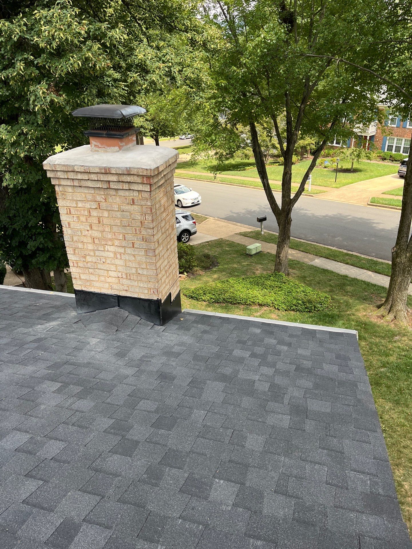 Vienna: Multi-Trade Restoration with CertainTeed Landmark Shingles in Charcoal Black by RM Banning, Inc.