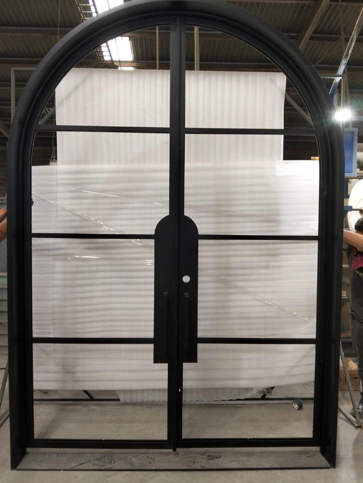 Custom Arched Metal Entry Door Installation in Plano by Solara Custom Living