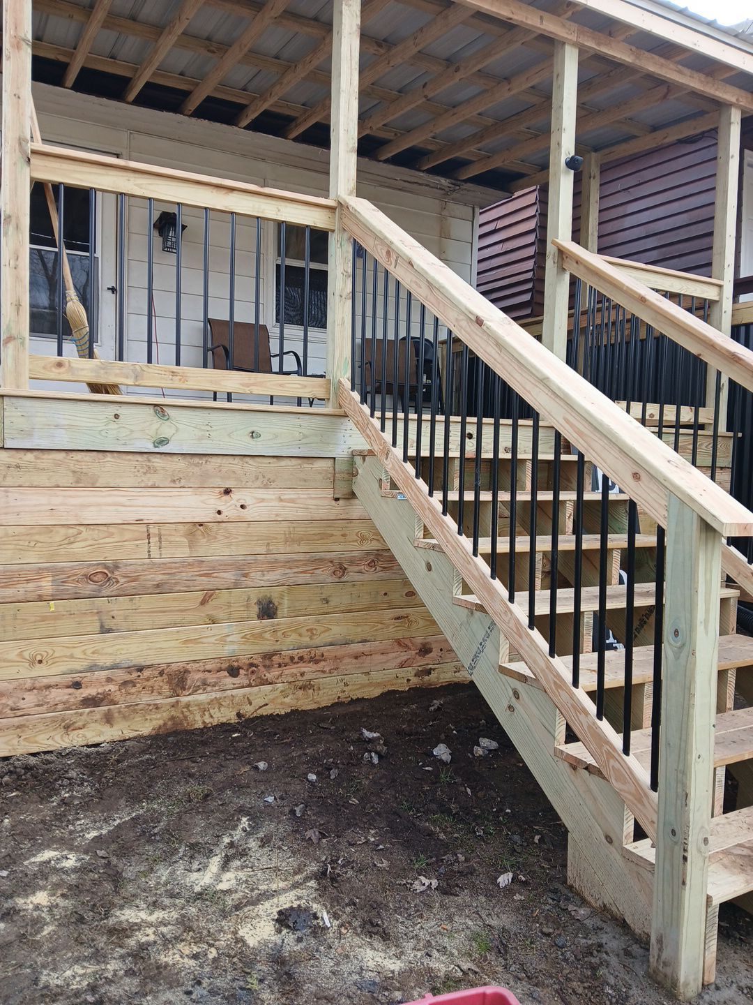 Deck Installation using Treated Lumber  by Leach and Brown Construction LLC