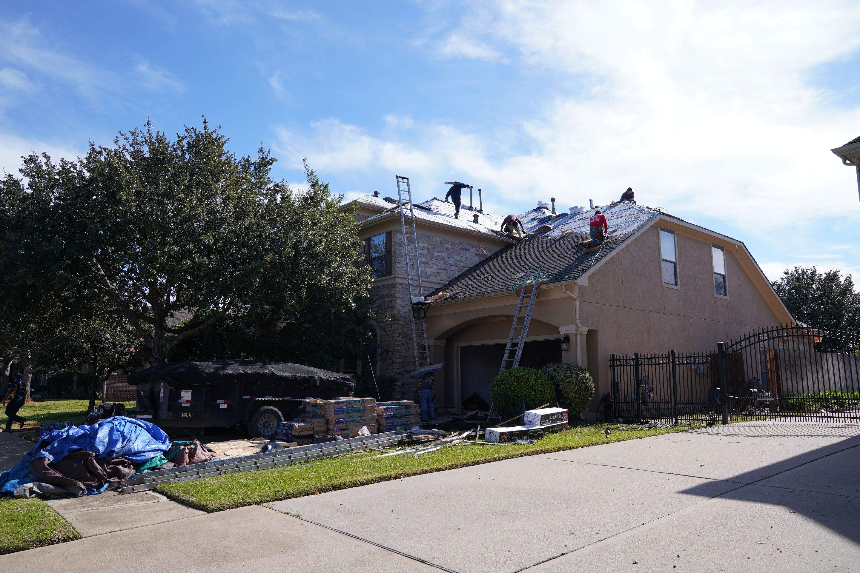 Two-Story Roof Replacement & Chimney Stucco Repair — Houston, TX by PL Roofing & SB Roofing, LLC.