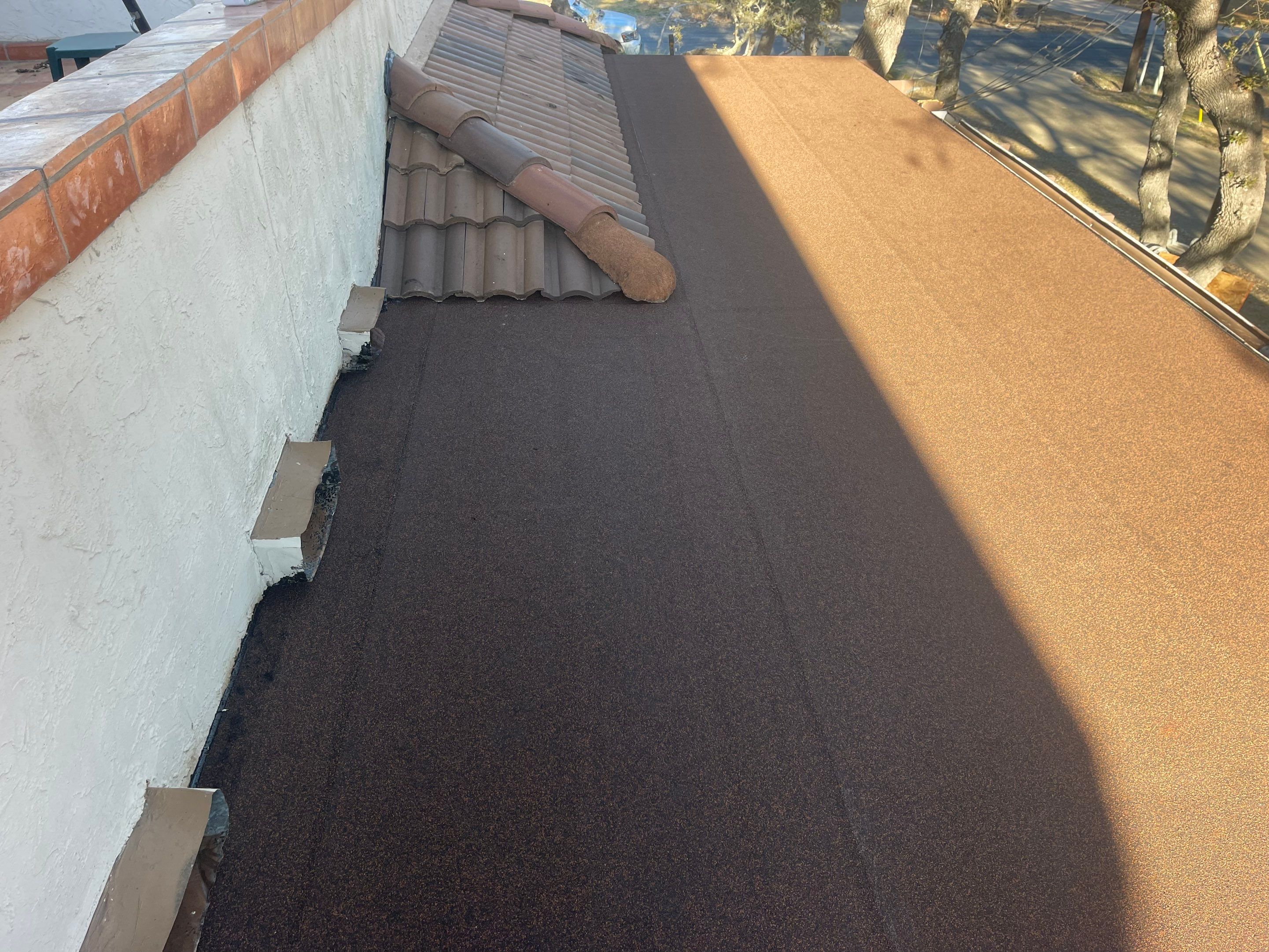 Residential Flat Roof Replacement using Mulehide Modified Bitumen Roofing by Premier Roofing and Contracting
