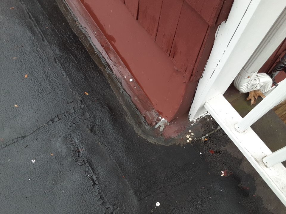 Residential Roof Replacement using Patio Roof by Absolute Roofing and Construction
