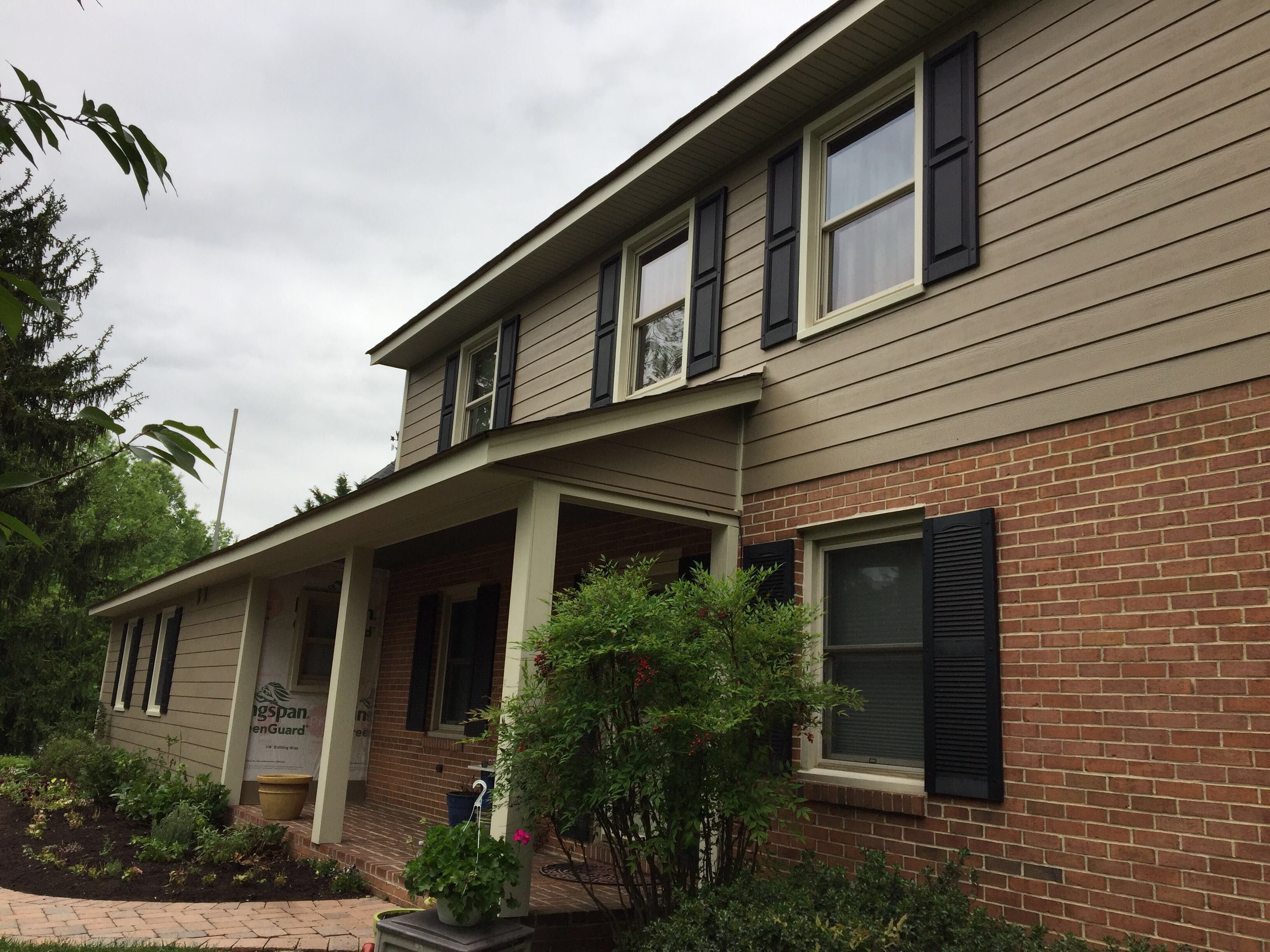 Siding and Roof Replacement by American Home Contractors