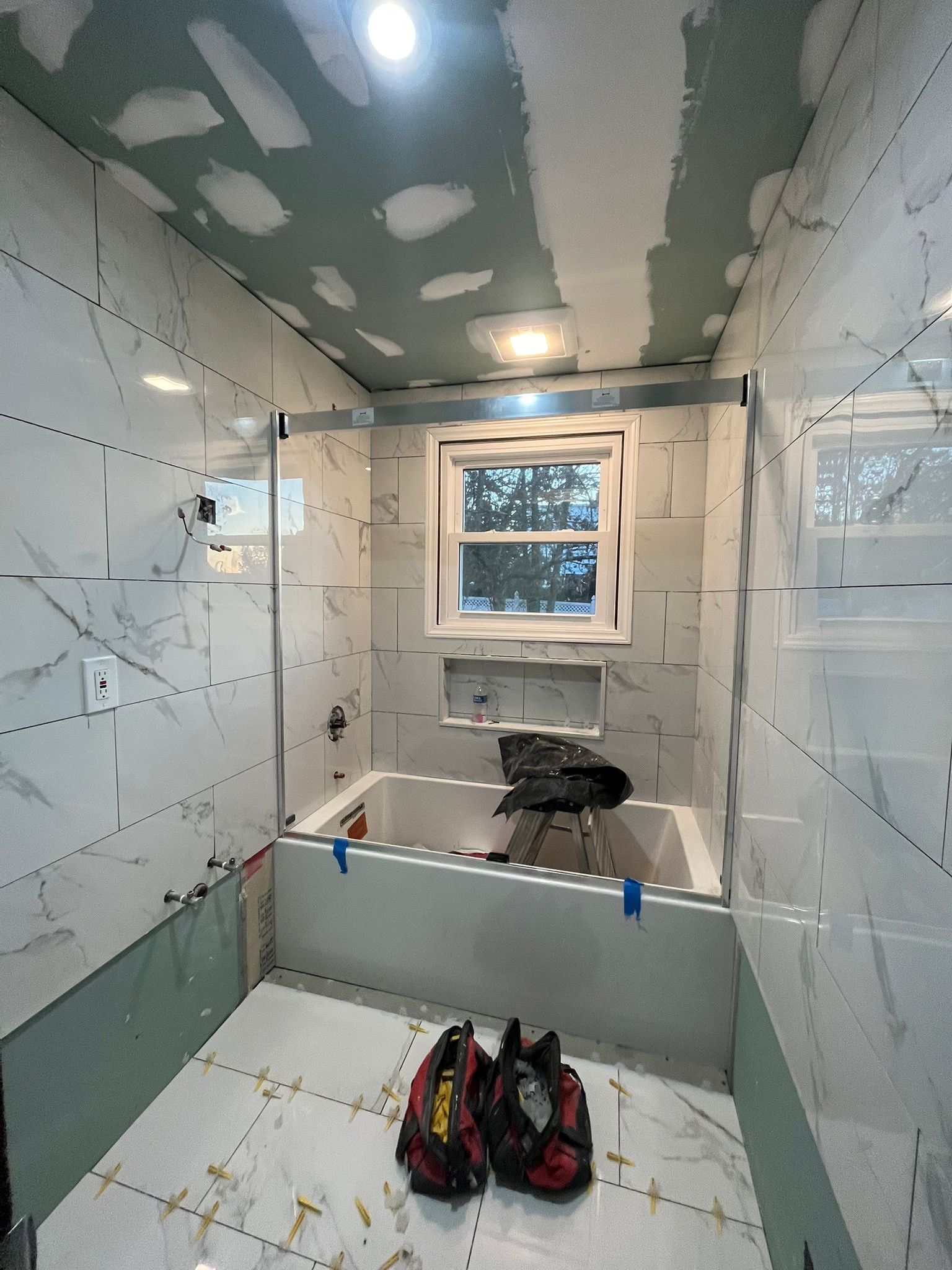 Bathroom Remodel using Tile by Home Concepts Construction
