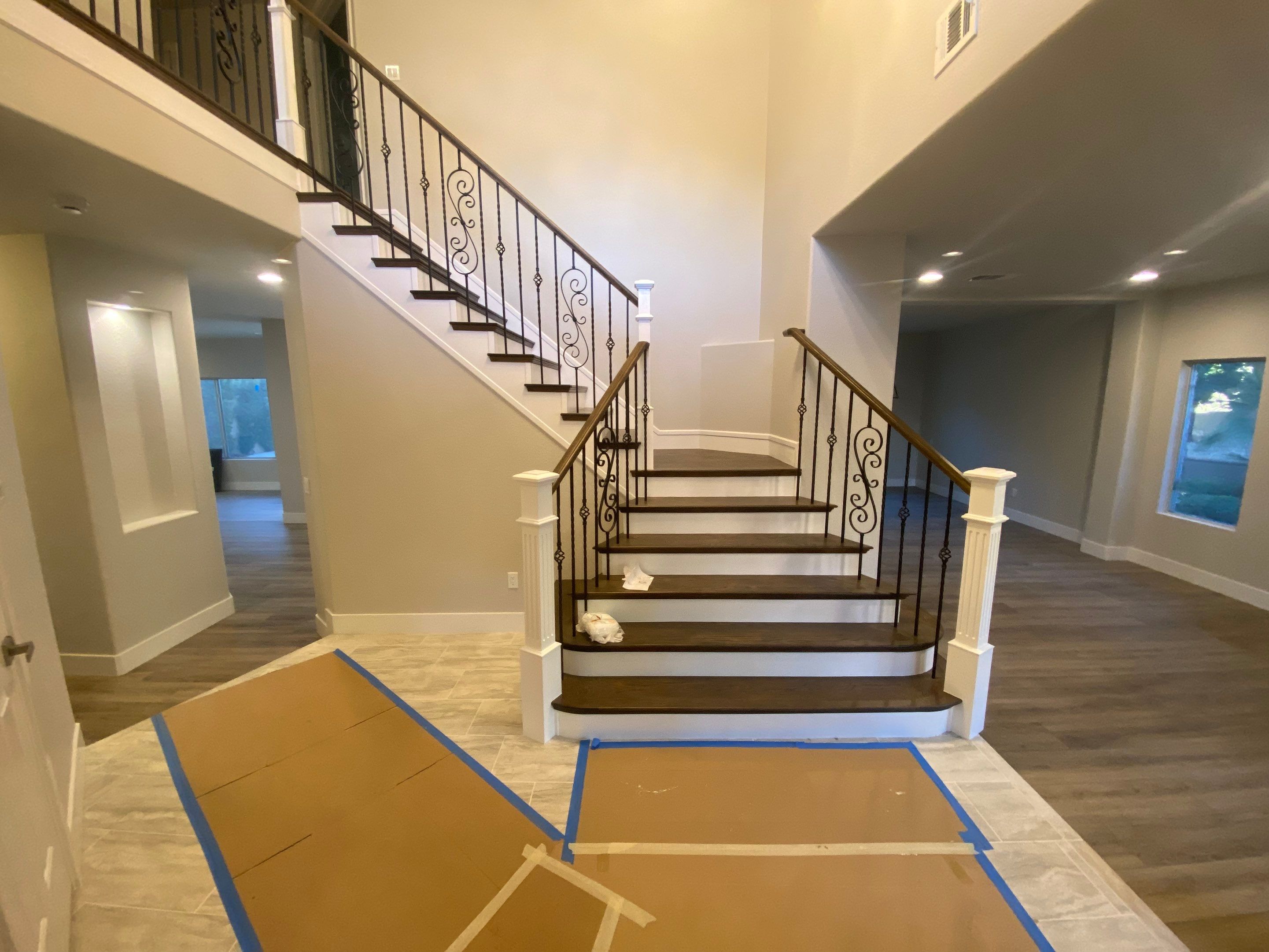 Stair refinish & cosmetic remodel  by Level Builders
