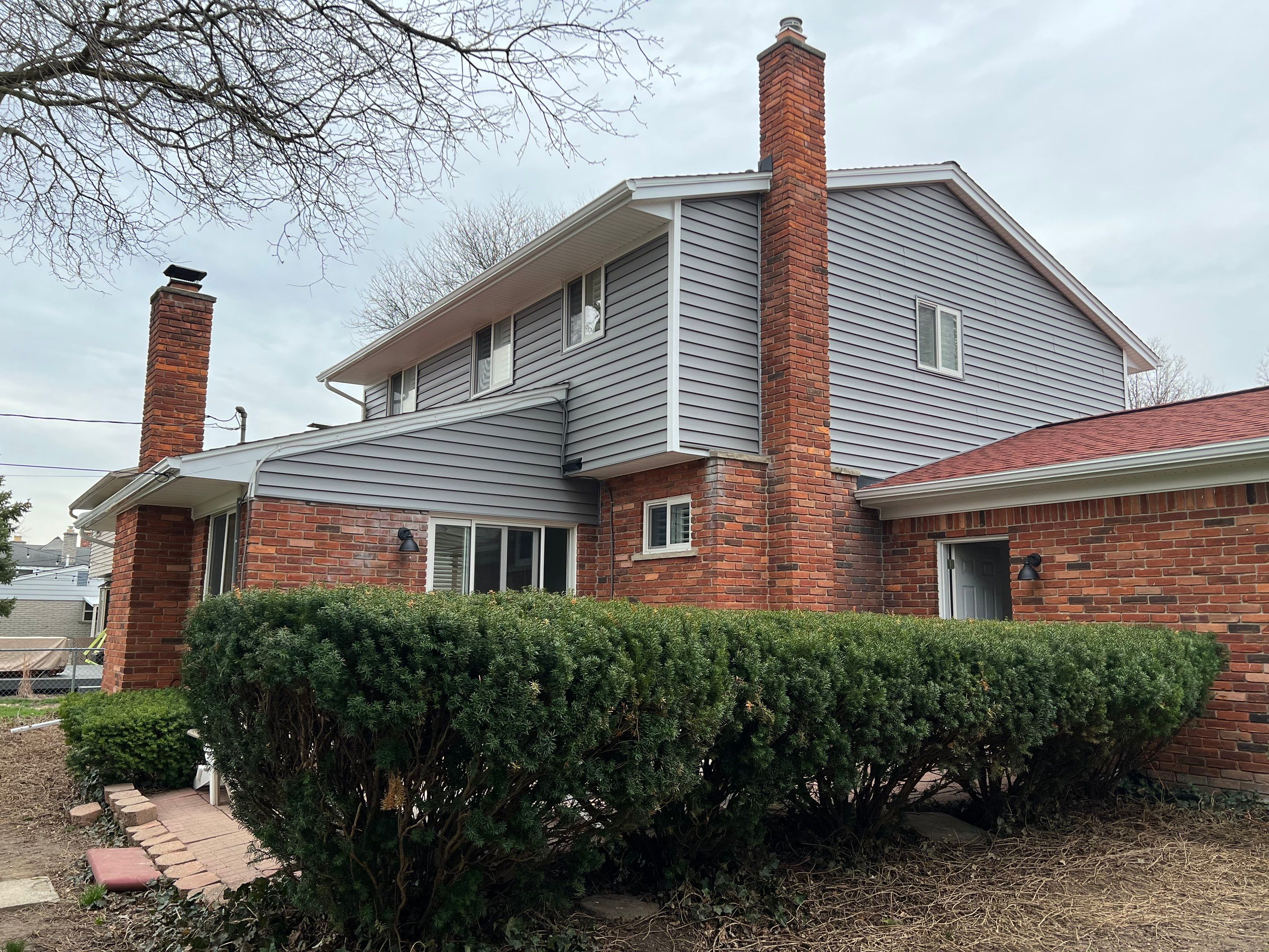Vinyl Siding Replacement - Private Residence  by Bloomfield Construction & Restoration